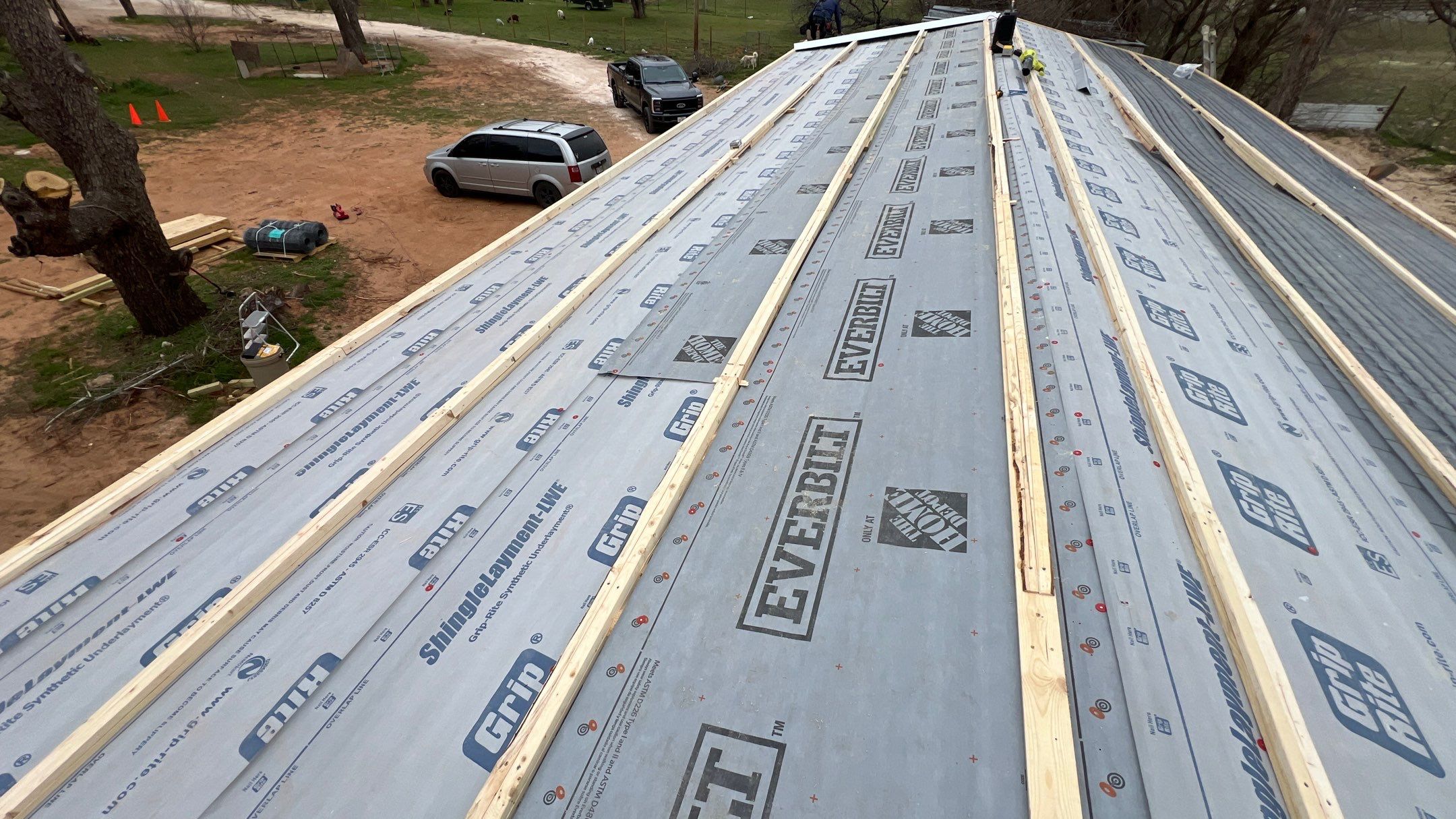 Residential Roofing Installation using PBR Metal Roof by Harvey Roofing & Construction