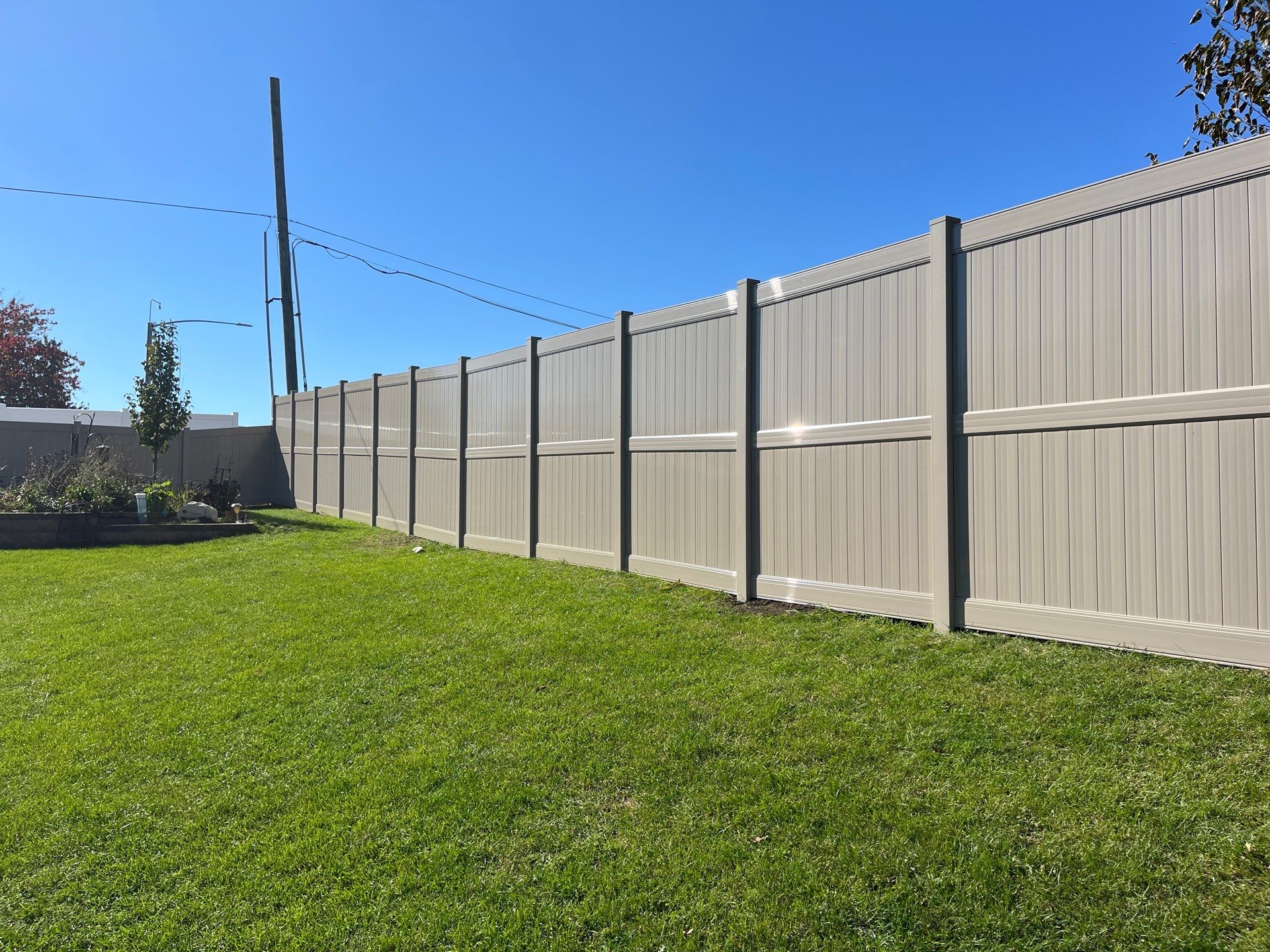 Adobe Vinyl Privacy Fence and Gate Installation in Cedar Falls by Perfect Picket Fence and Stain
