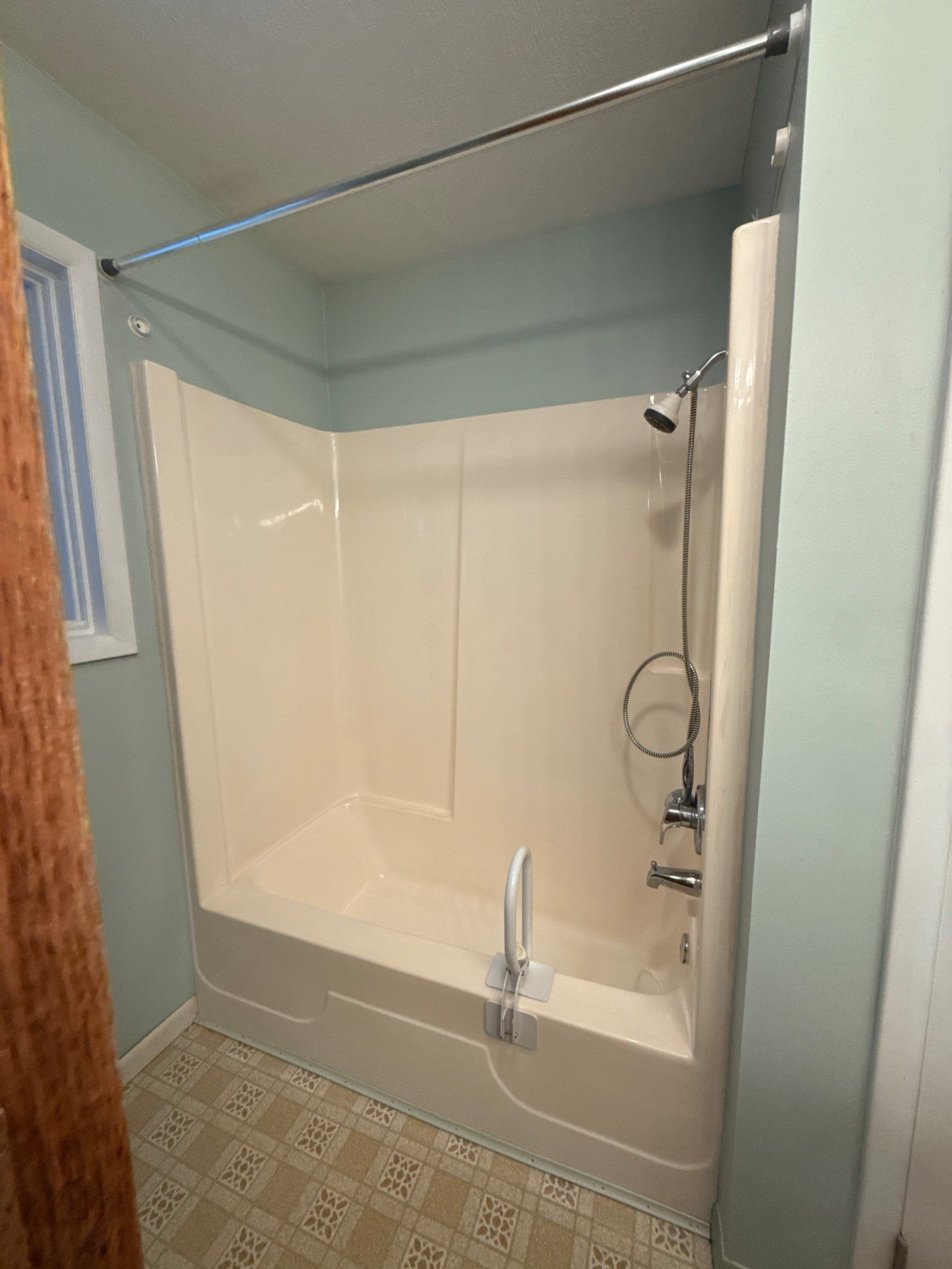 Alcove Bathtub and Shower Installation in Ellsworth, MI by Rainbow Seamless Systems