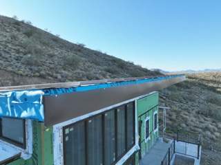 Dark Bronze Standing Seam by Reimagine Roofing