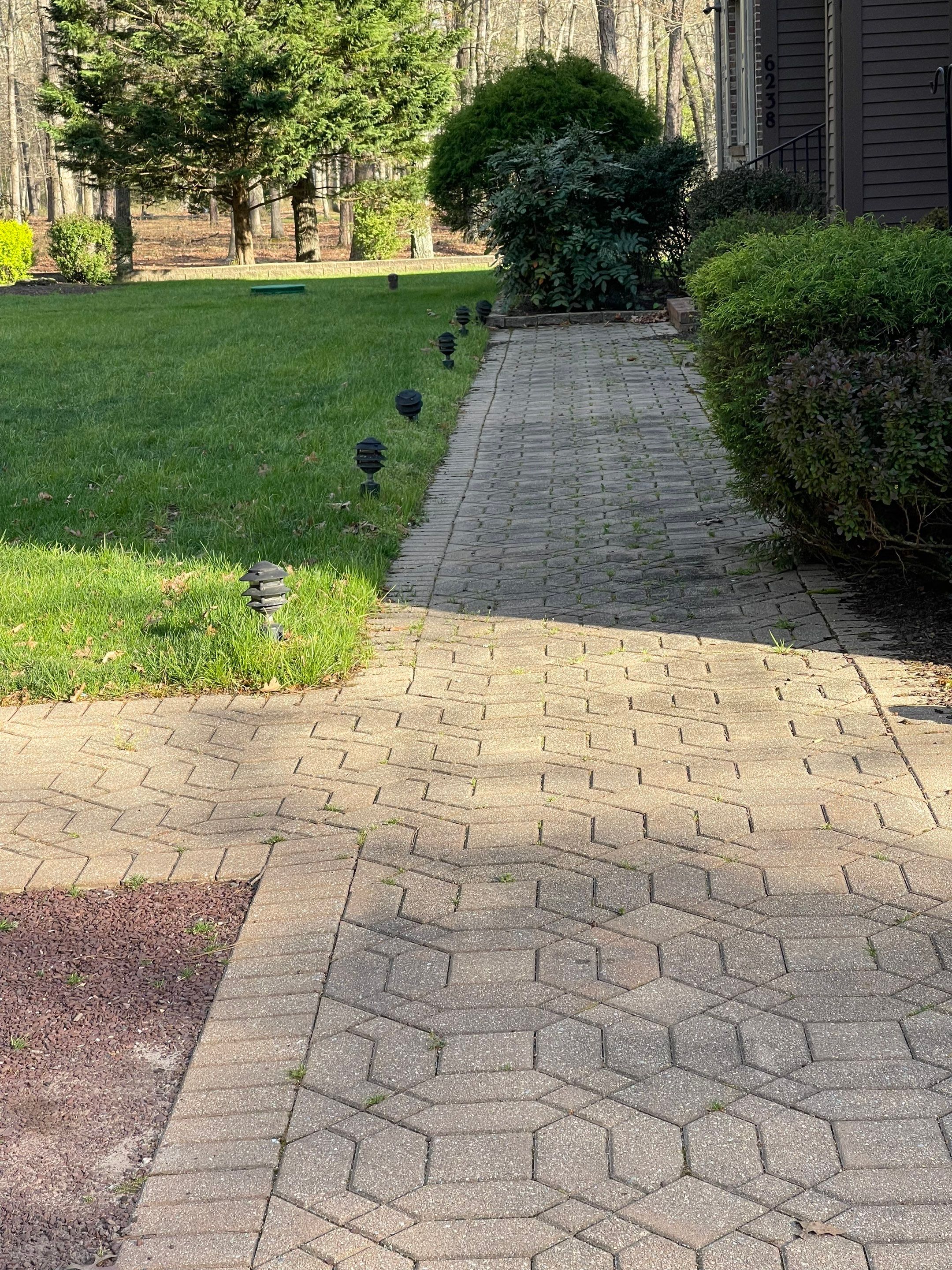 Pavers Cleaned, Garage and Concrete walls by SJ Exterior
