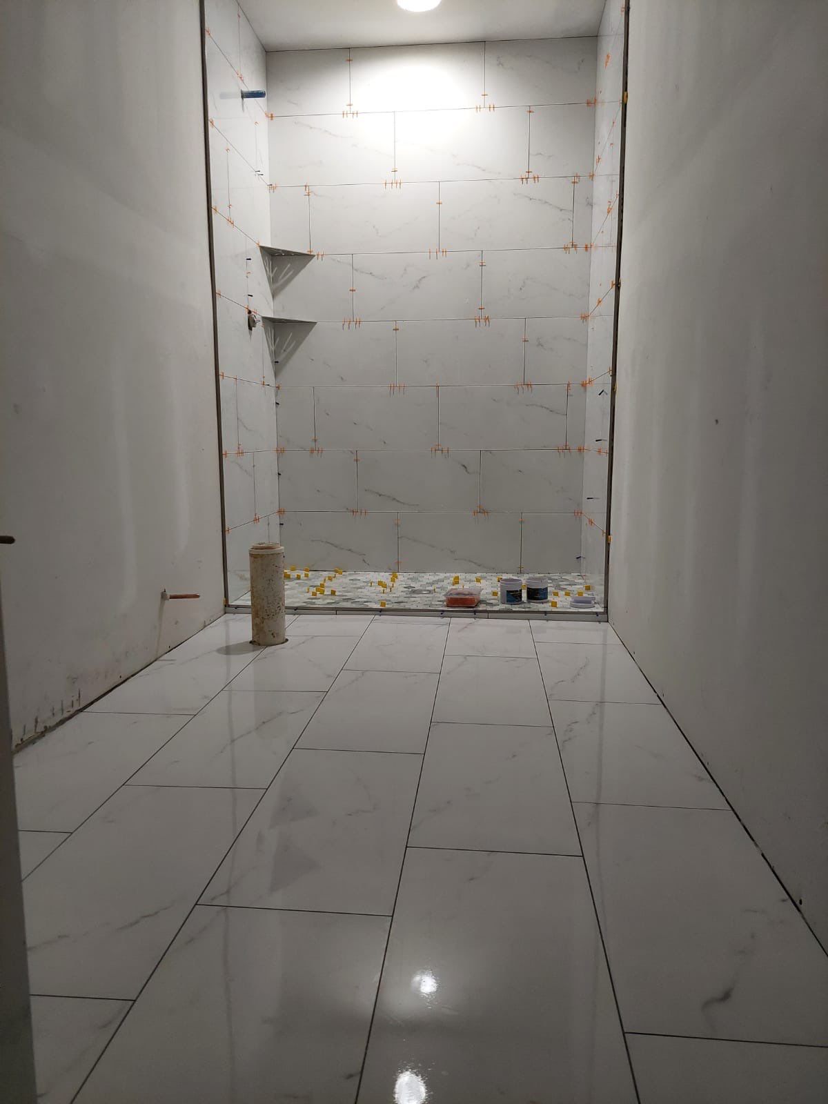 Marietta Basement Remodeling Featuring Custom Wet Bar and Marble Shower by Swift Home Renovations