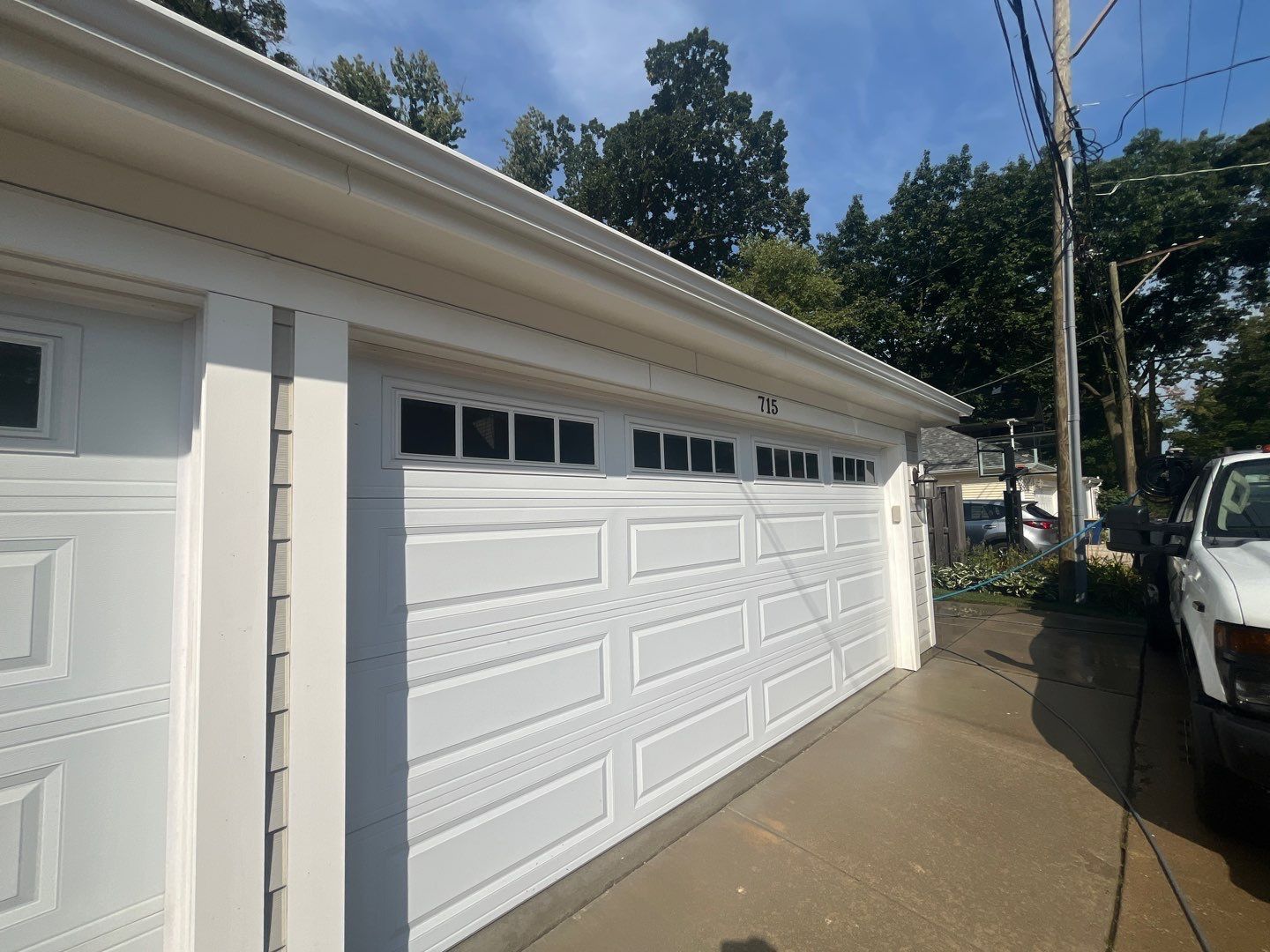 Hardie Board House & Detached Garage Soft Washing by Northern Power Washing LLC.
