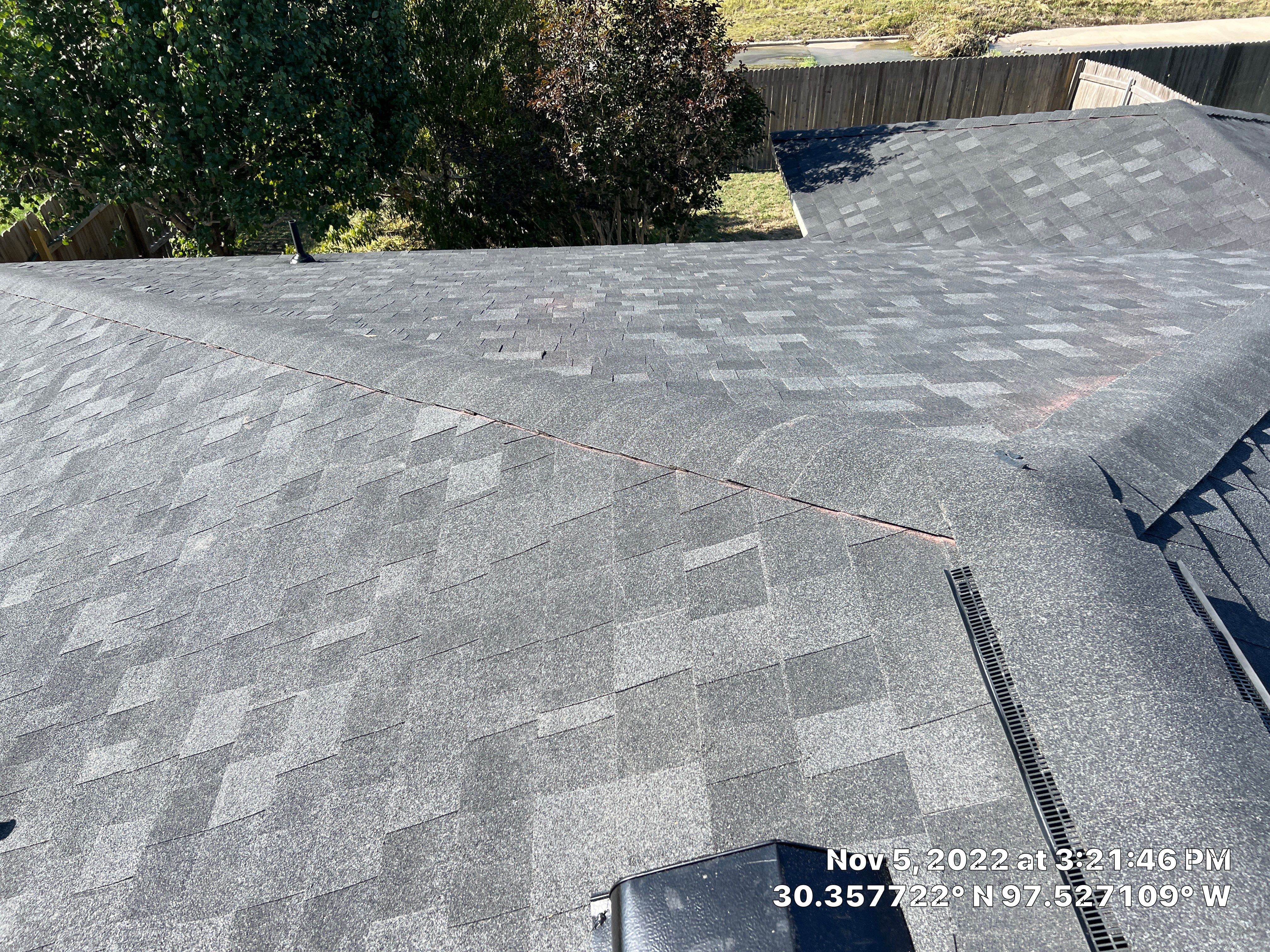 Asphalt Shingle Roof Replacement and Window Glazing in Manor by Caliber Restoration LLC