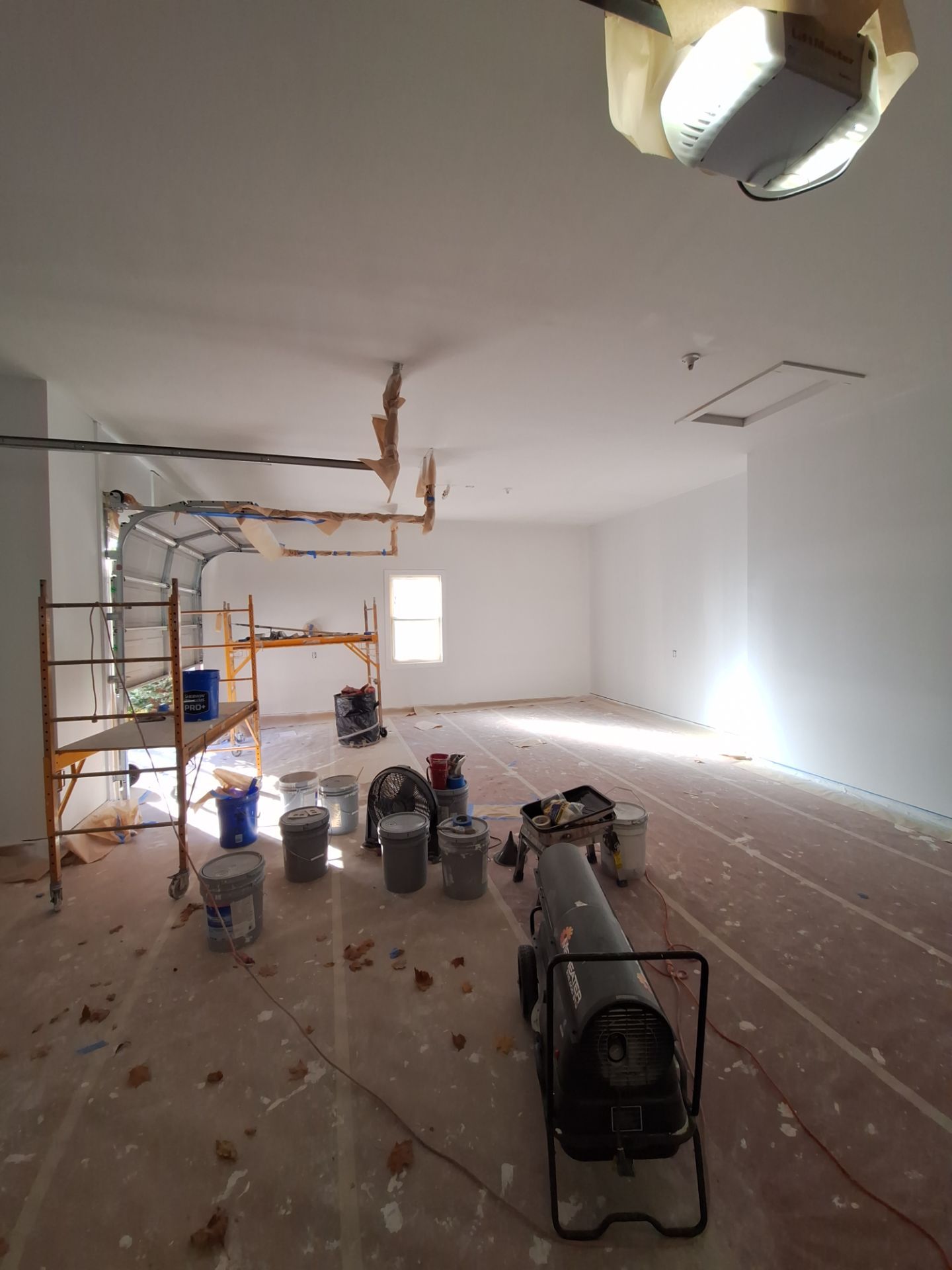 Hudsonville Garage Renovation Featuring Finished Drywall and Flake Epoxy Floors by Gordon Painting