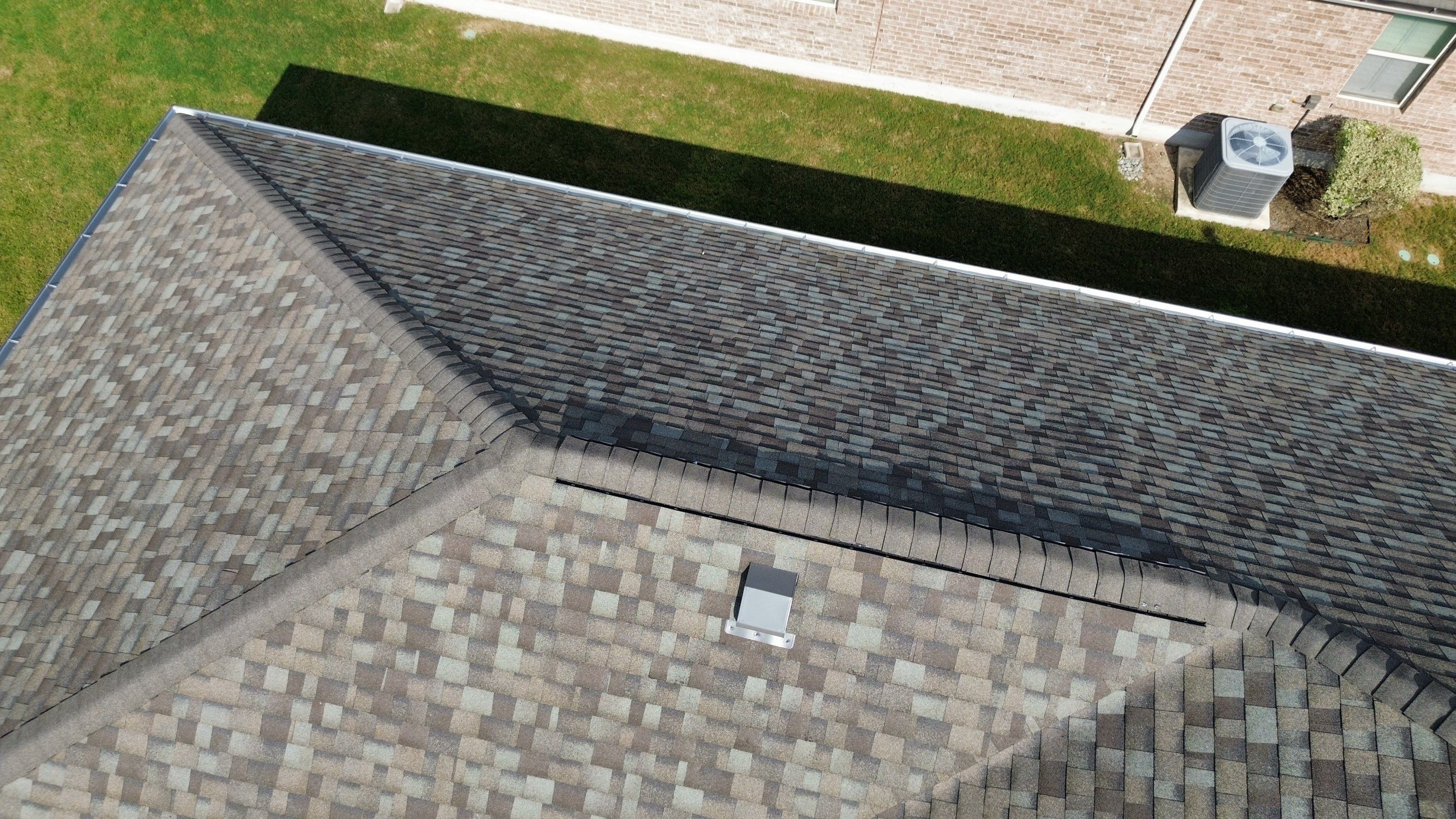 Full Roof Replacement with Solar Reinstall – Duration Driftwood | Round Rock, TX by Kstylez Roofing & Construction