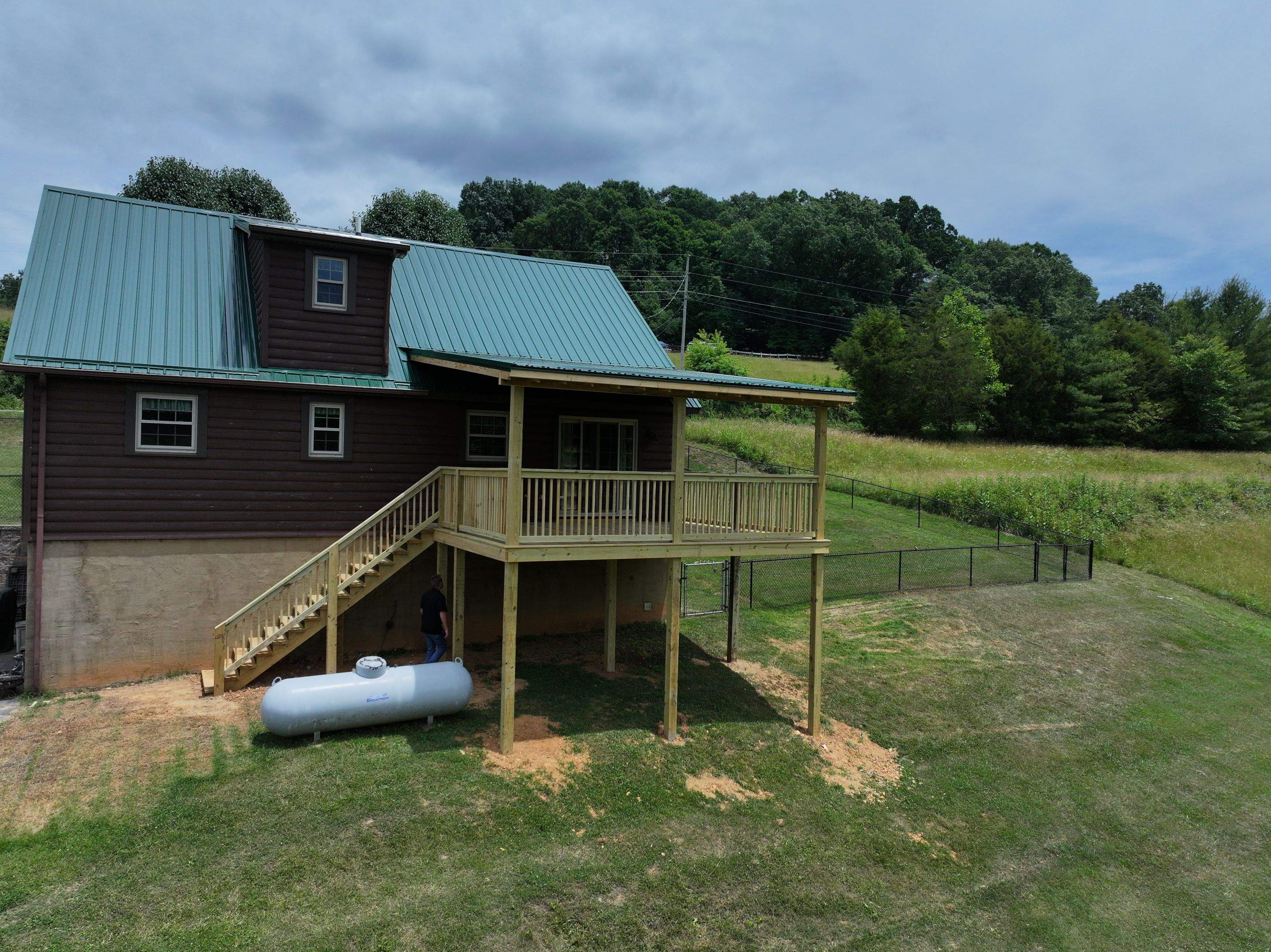 Paddle Creek Pet Ranch Cabin  by Omnia Roofing
