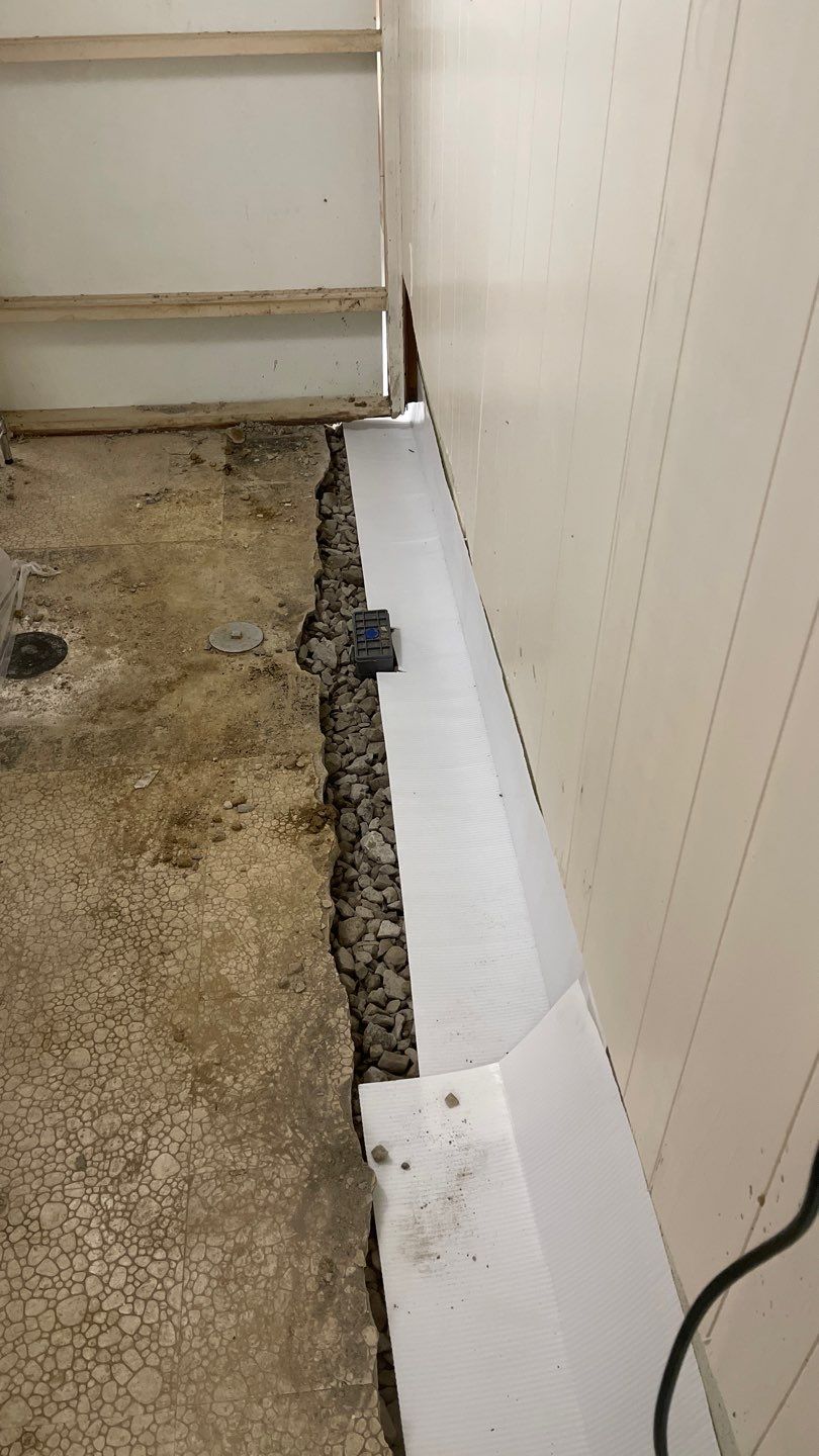 Interior Waterproofing Using GrateDrain™ Products by Toledo Basement Repair