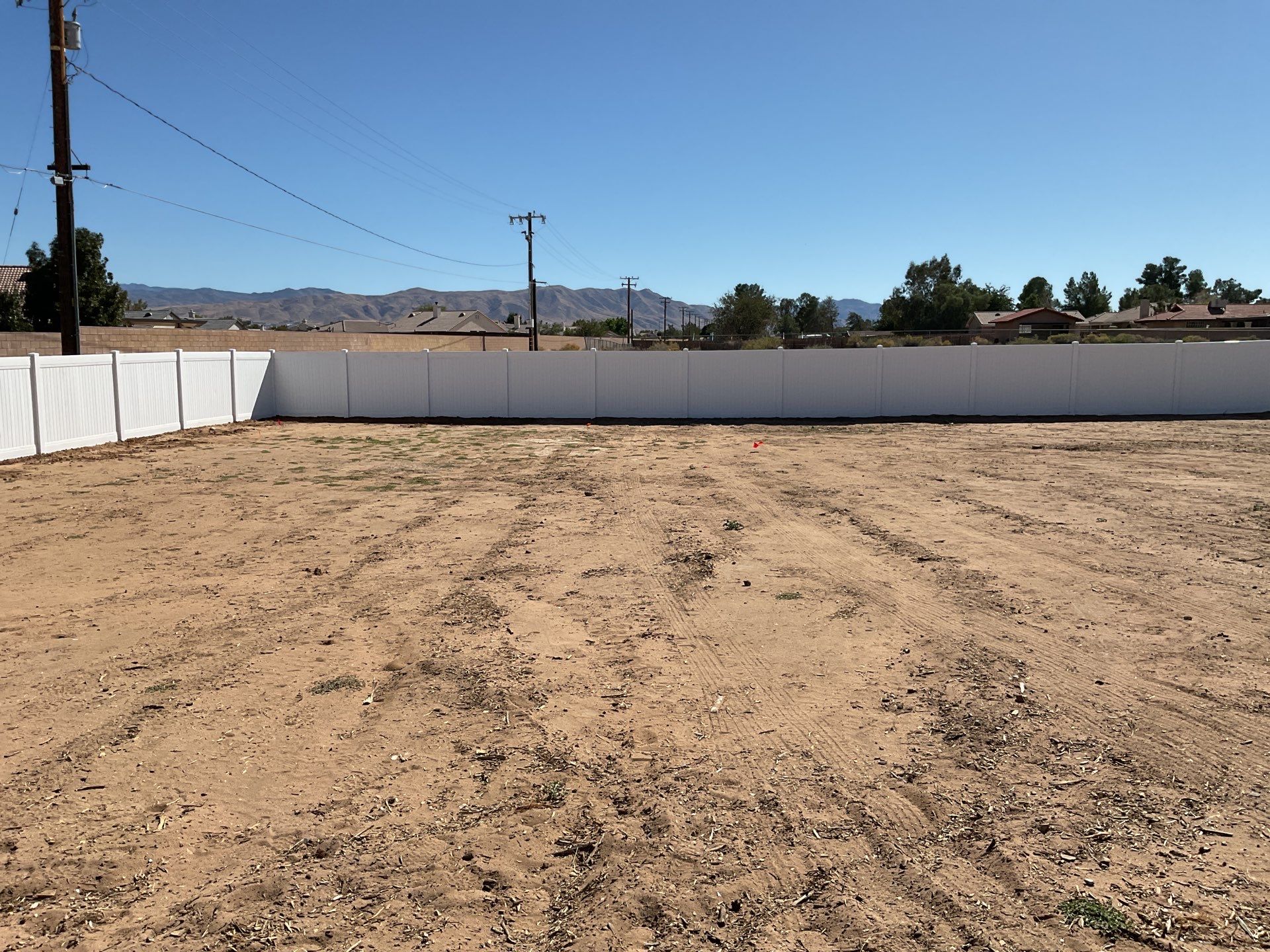 White picket fence  by Fence Guys Inc. 