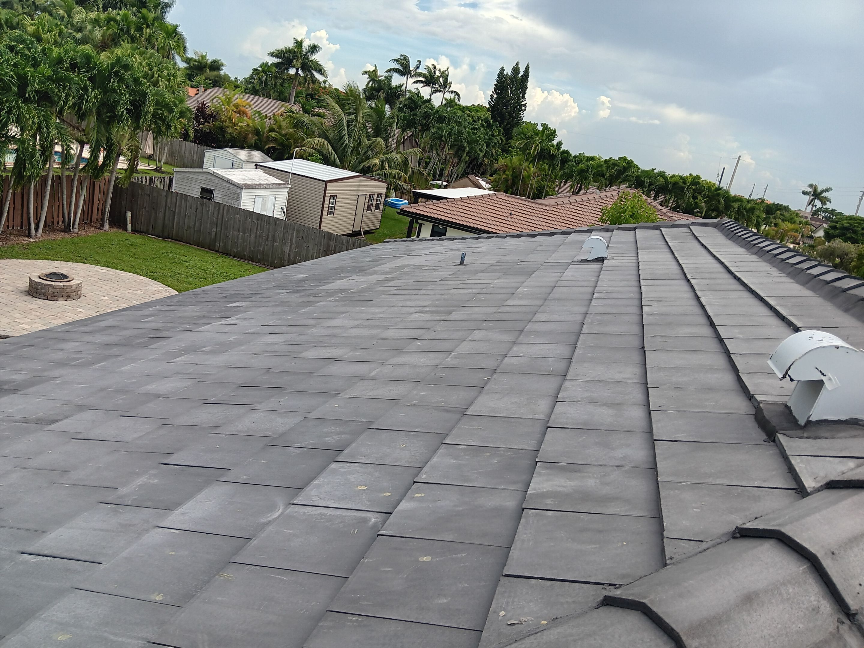 Residential Roofing Installation using Tile Roof by City Roofing Inc