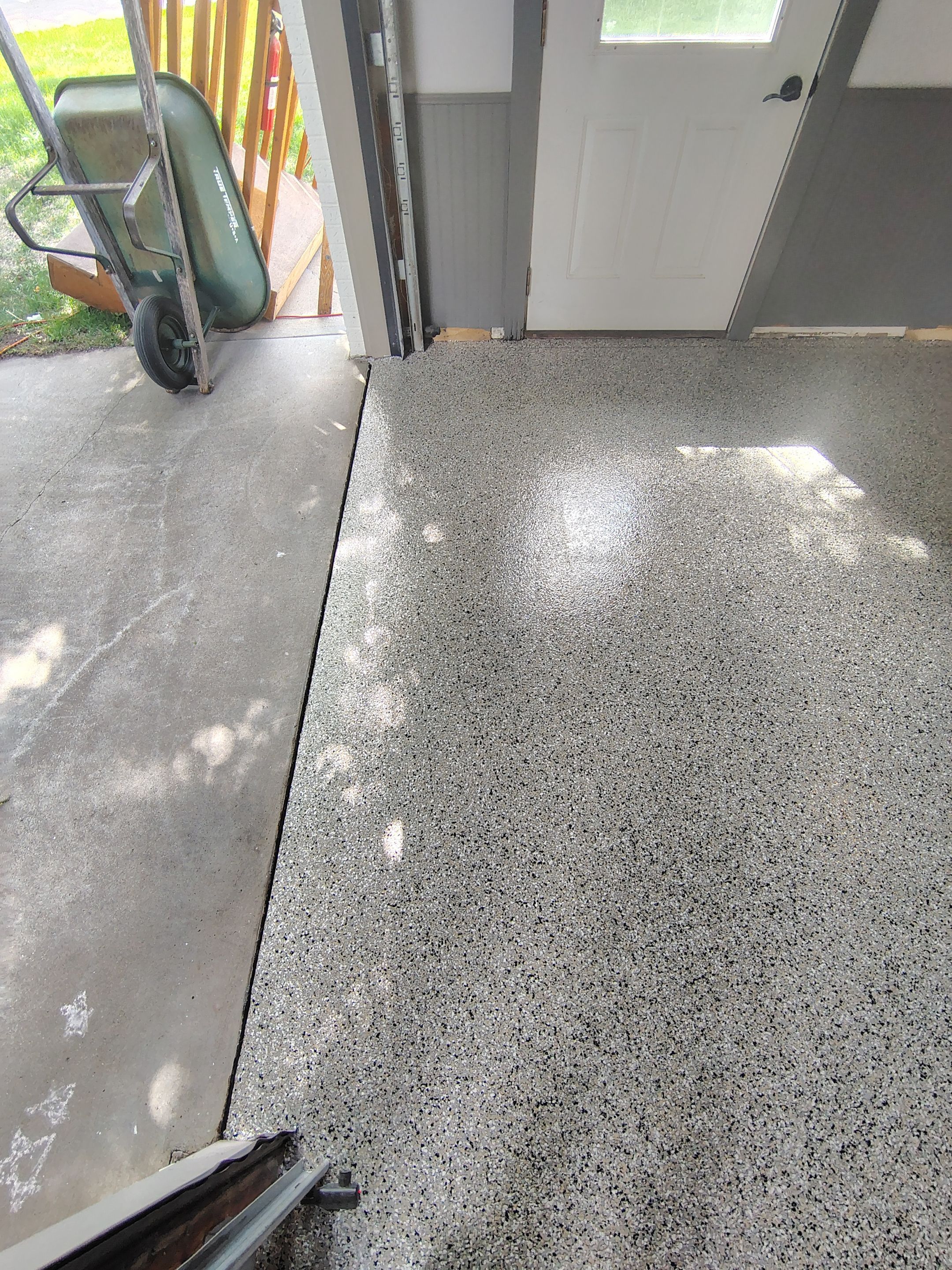 Multi-Fleck Epoxy Garage Floor Coating in Dell Rapids by Select Painting, Coatings & Garage Cabinets