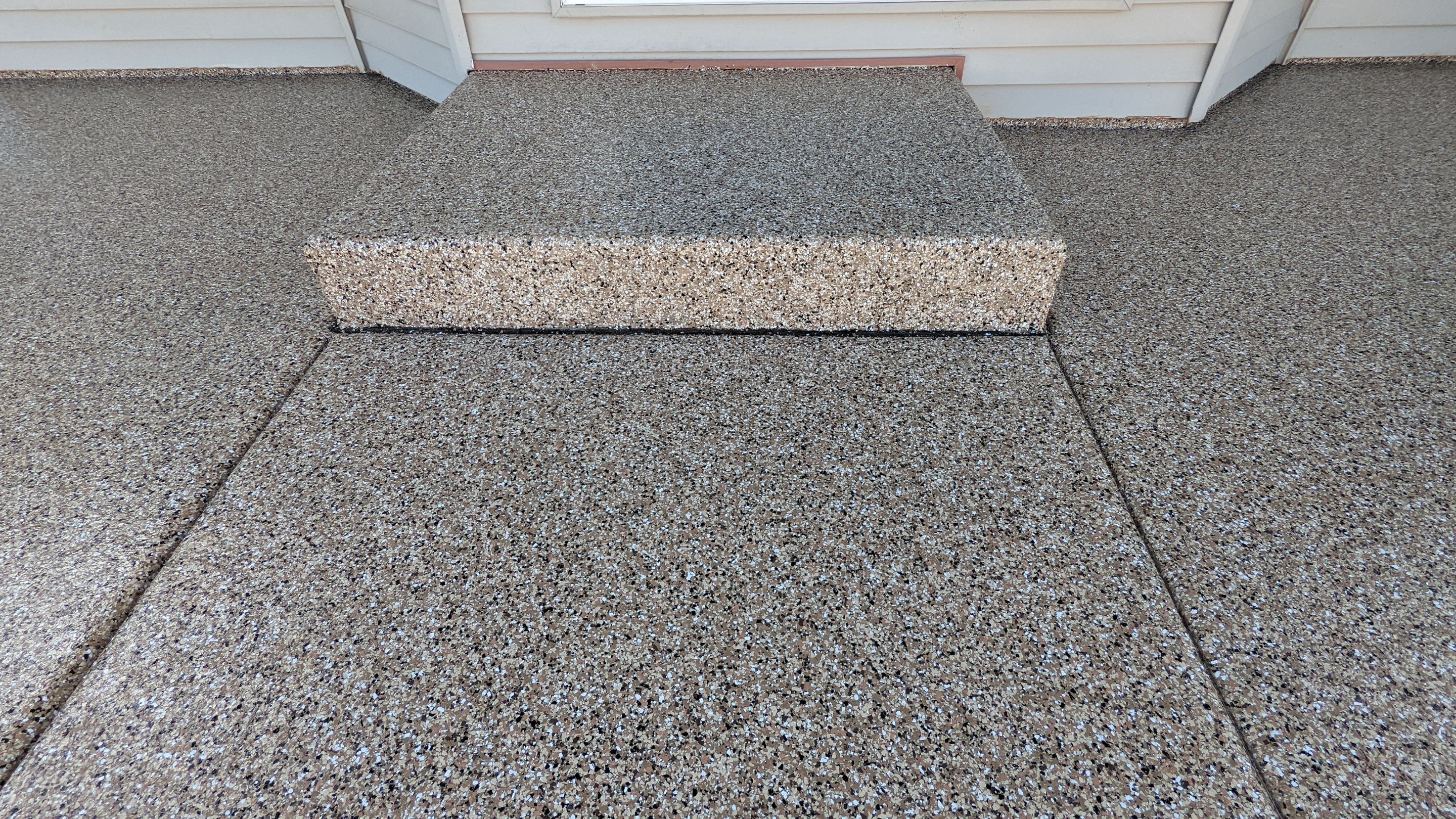 Patio Transformation using Sandstone by Croc Coatings, LLC