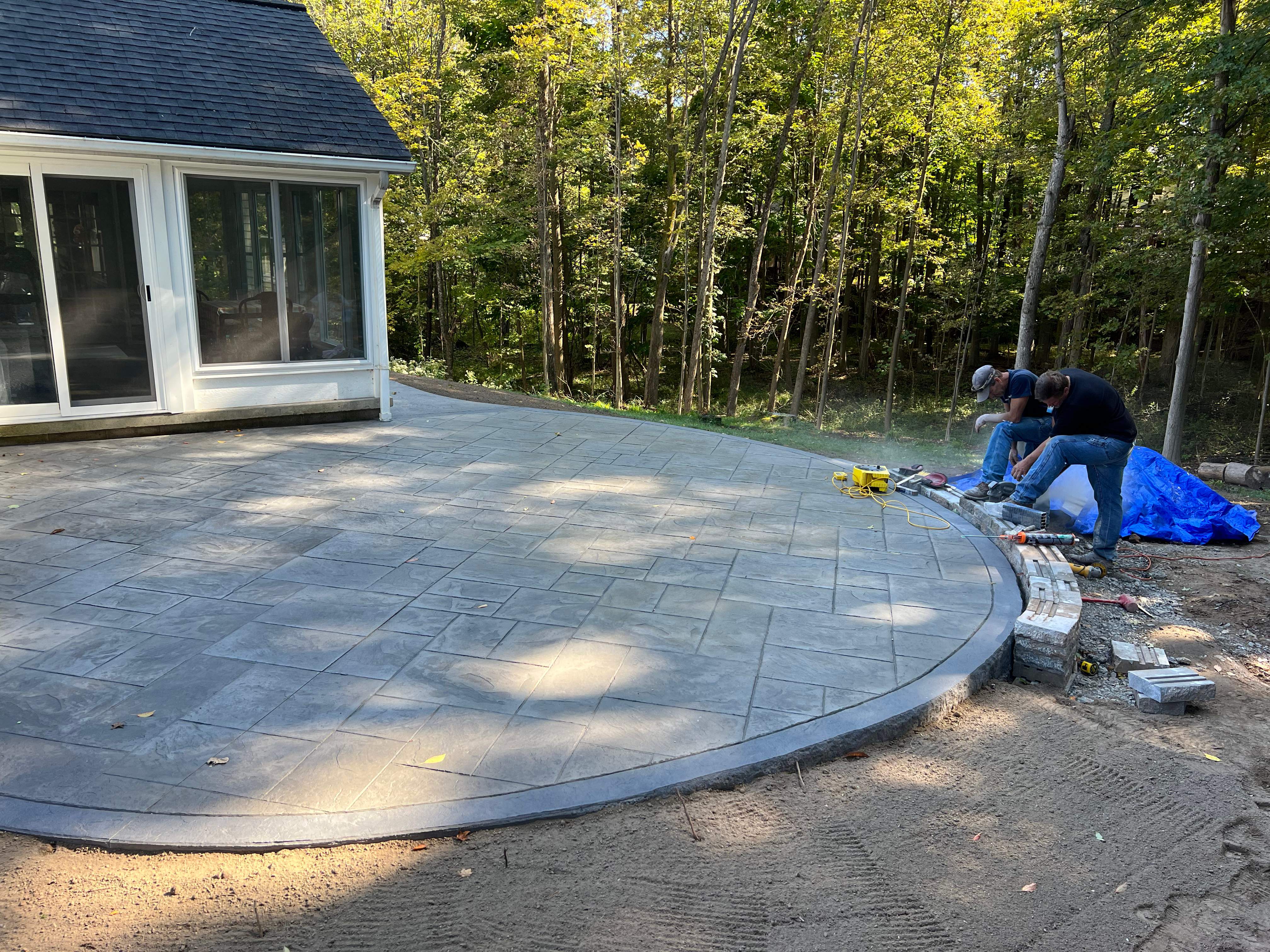 Majestic Ashlar stamped concrete patio by NG Masonry & Construction LLC