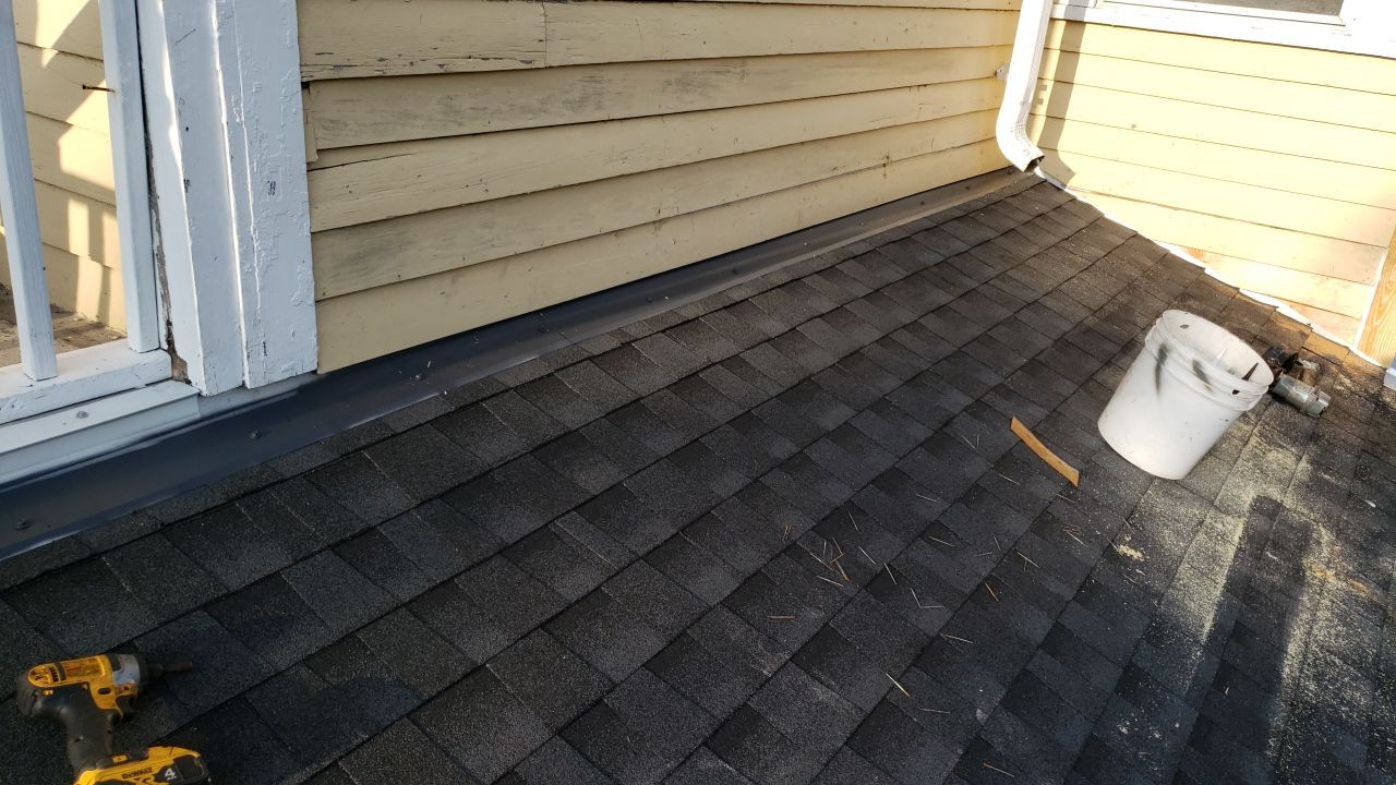 Residential Roofing Installation using Roof Replacement by American Roofing & Construction LLC