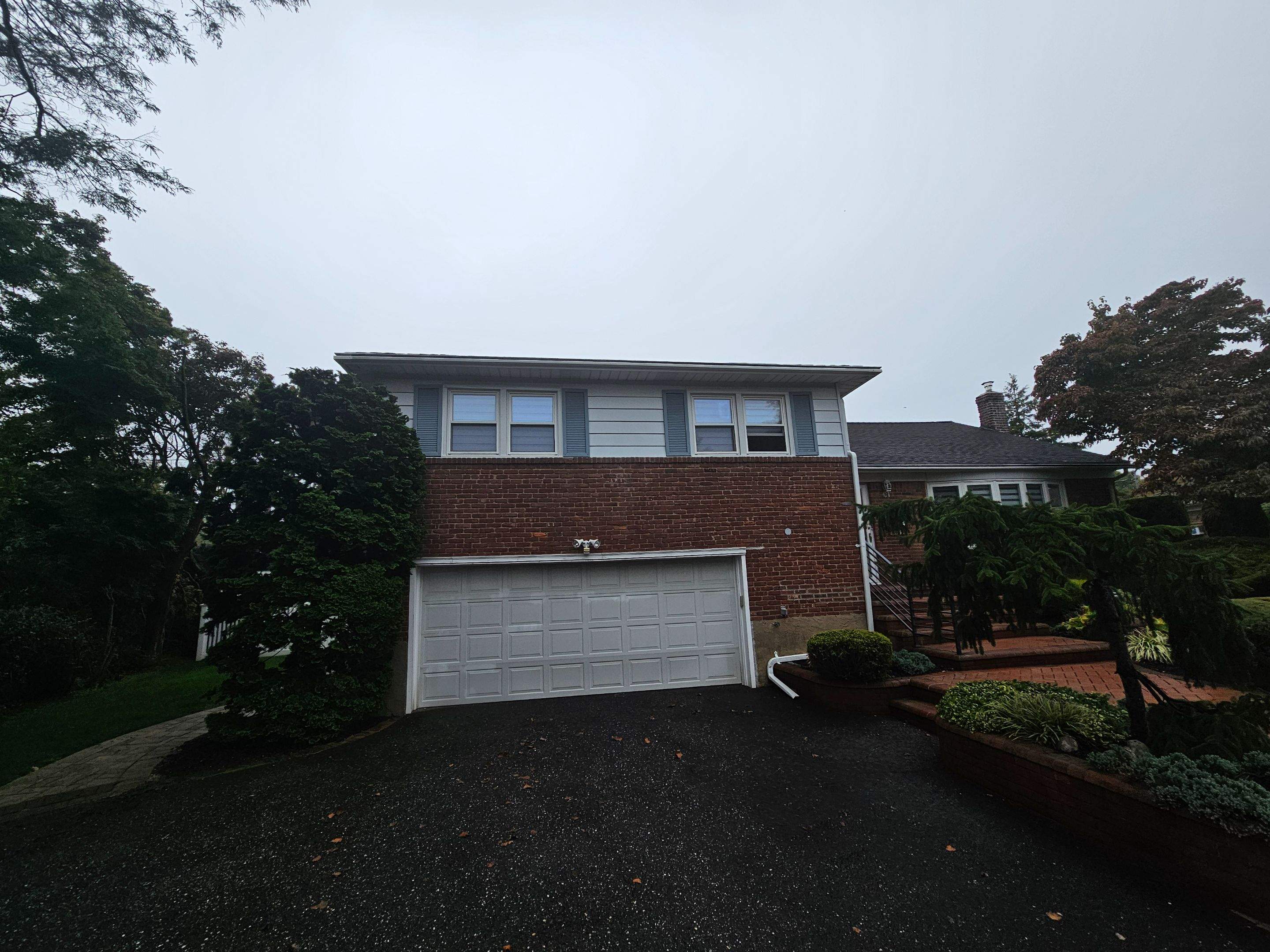 New Siding & Trim by Island Roofing Inc.