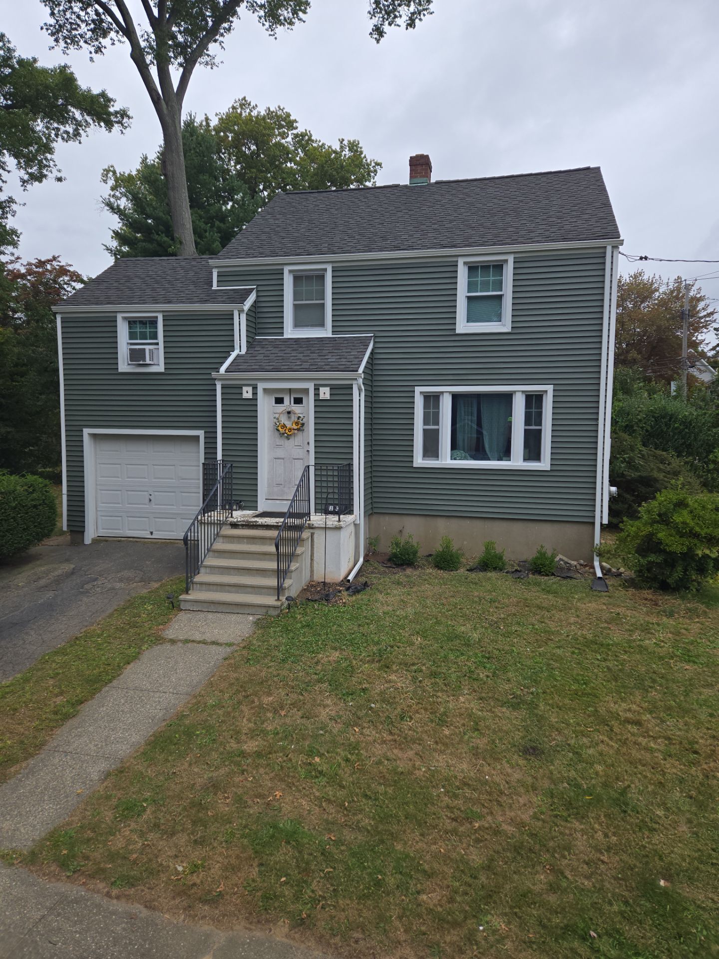 Siding Installation using CertainTeed Monogram Vinyl Siding - D4 - Forest by A Plus Exterior