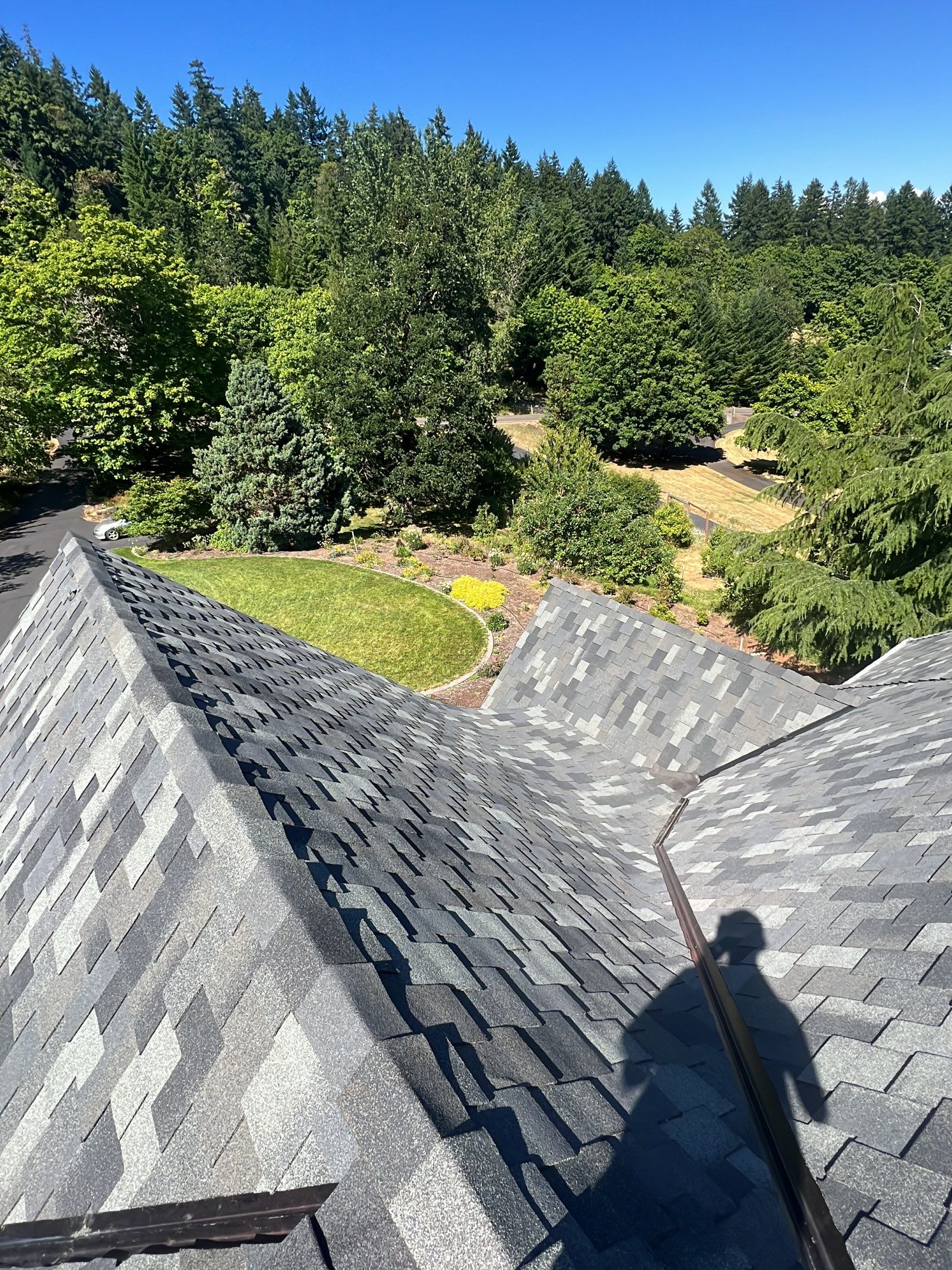 Residential Roofing Installation using Malarkey Windsor 50 Year Shingle (Color: Storm Grey) by Orezona Building & Roofing Company, Inc.