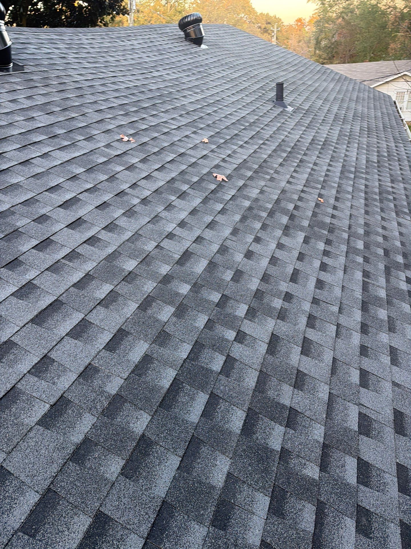 Roof Replacement in Midfield (Charcoal Shingles) by The Roofing Dudes