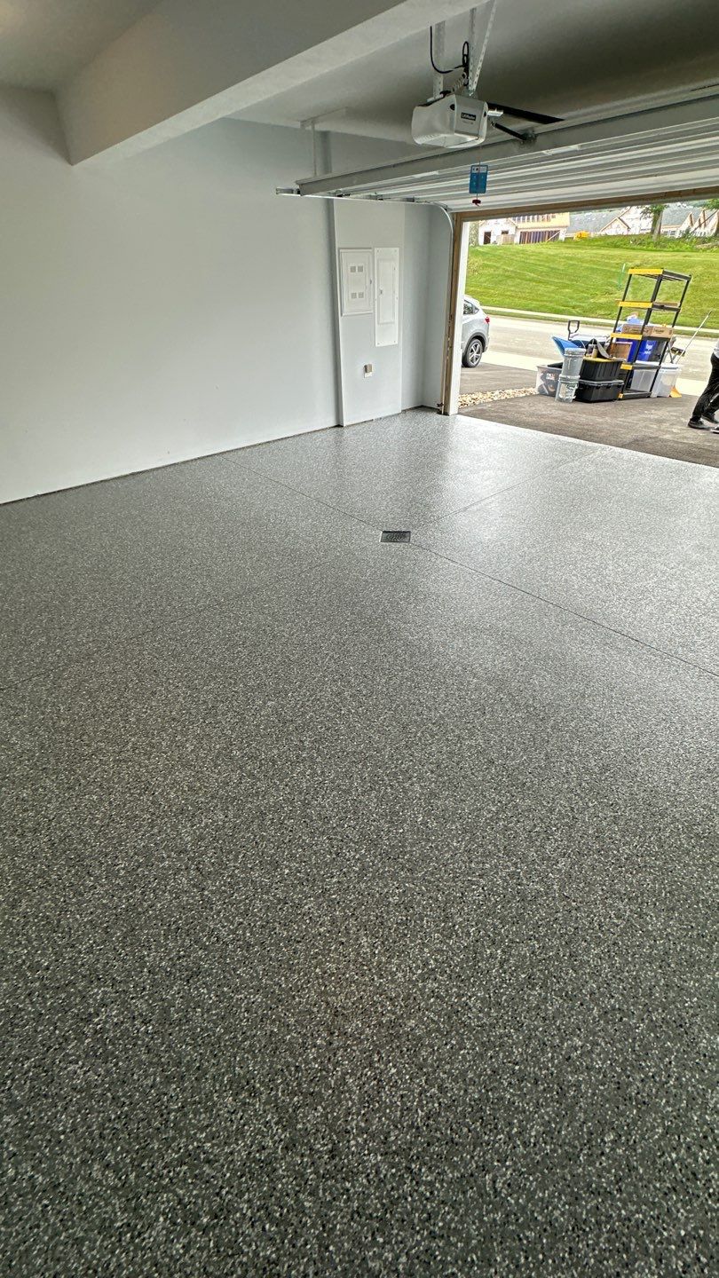 Porch + Garage Project in Evans City by Floors in a Day, Inc