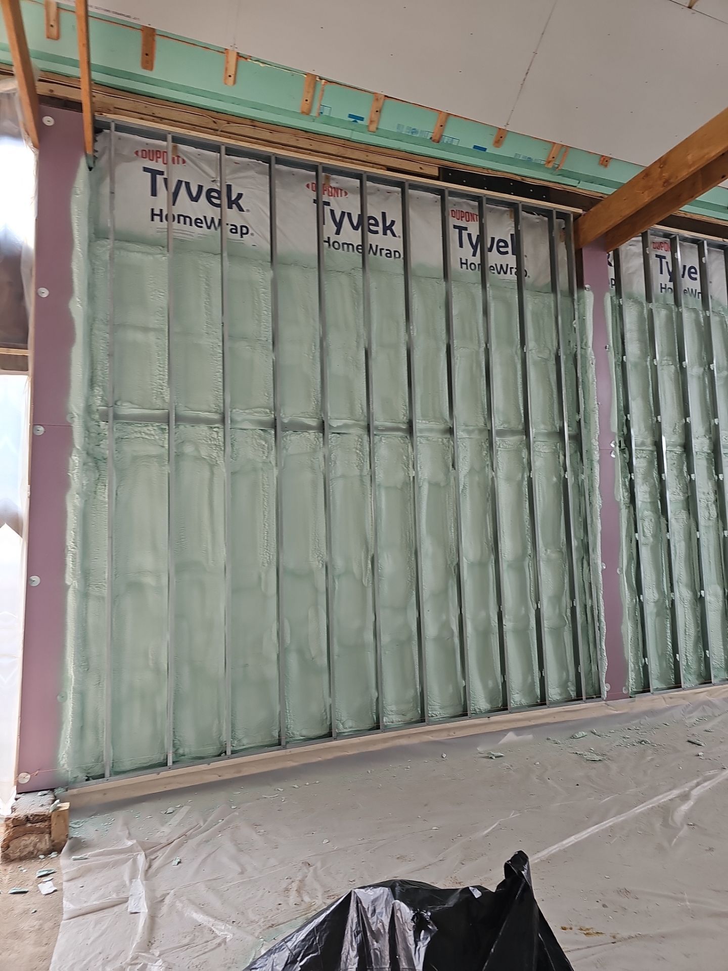 Exterior Installation using Closed Cell Spray Foam by NYS Foam & Energy