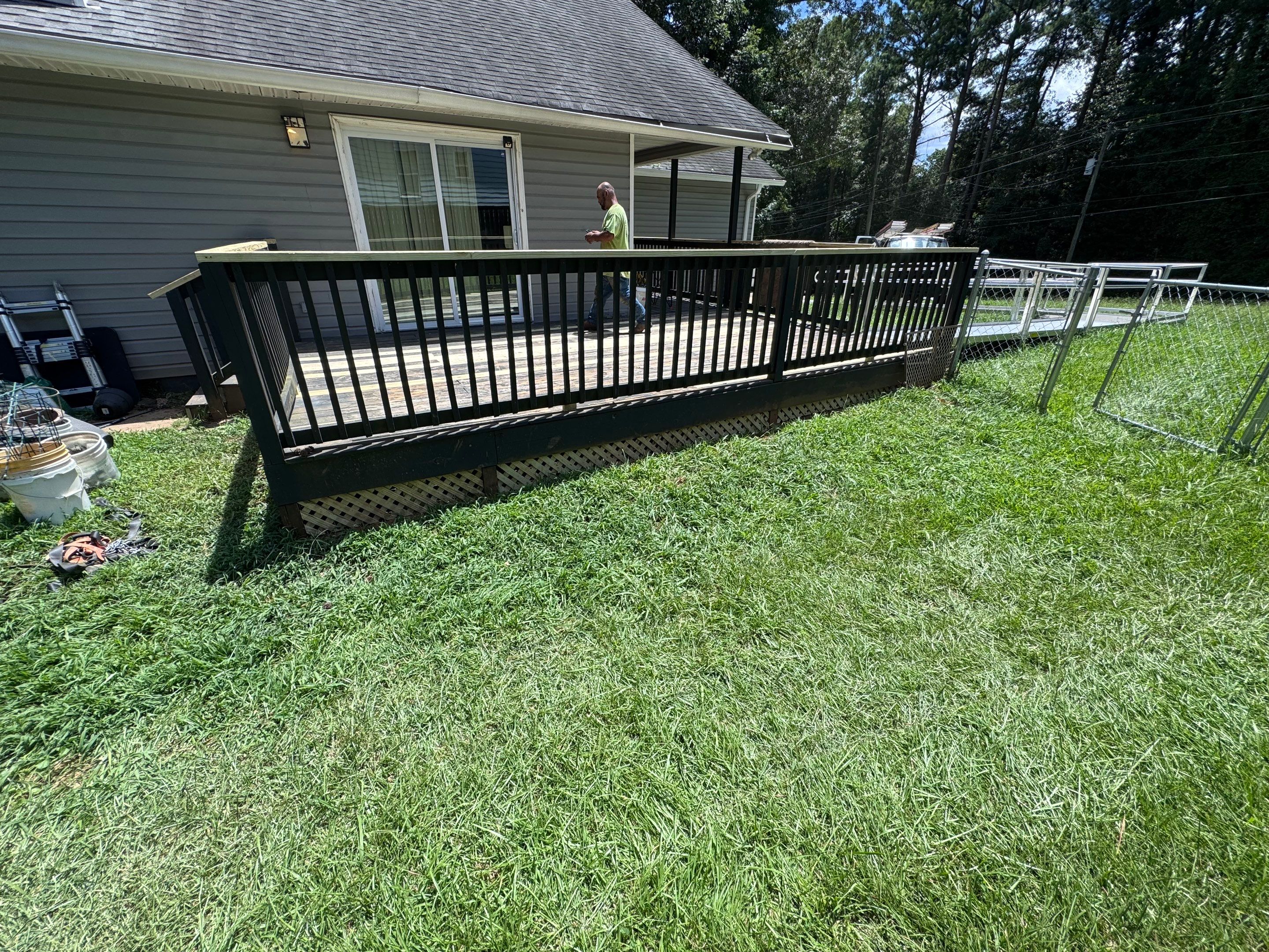 Deck Refinishing and Exterior Painting with Custom Green Finish in Decatur by Swift Home Renovations