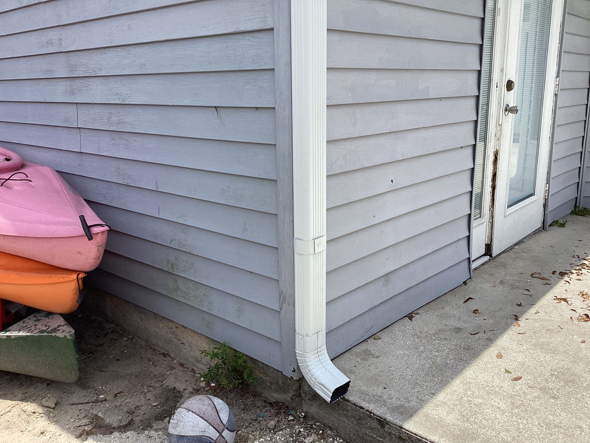 Aluminum Seamless Gutters using Splash Guard in Cape Coral FL by Gutter Professors