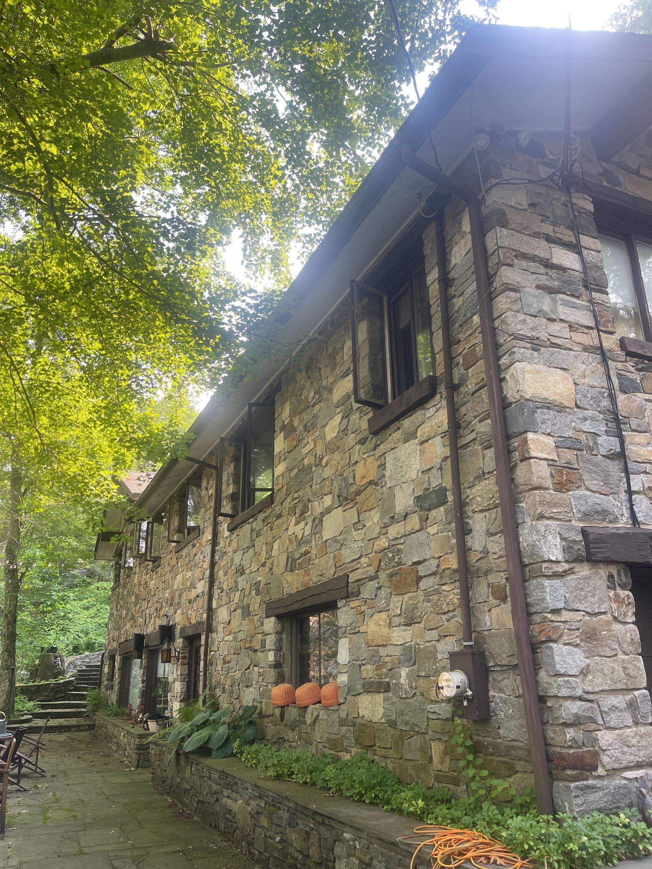 Gutter Installation using 5k Brown Gutters by A Plus Exterior