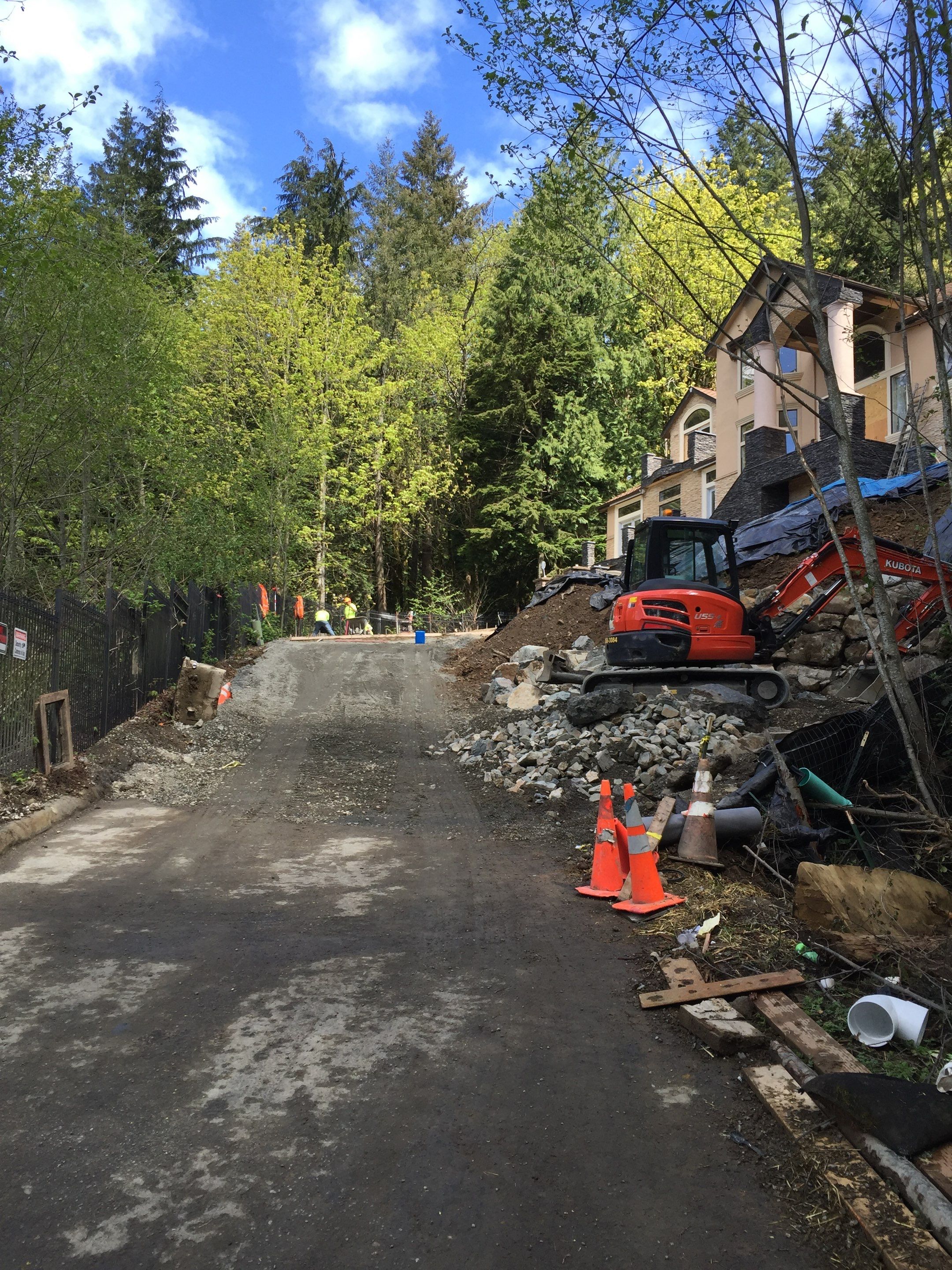 Asphalt Driveway and Stamped Concrete Patio Finish  by Jireh Asphalt & Concrete Inc 