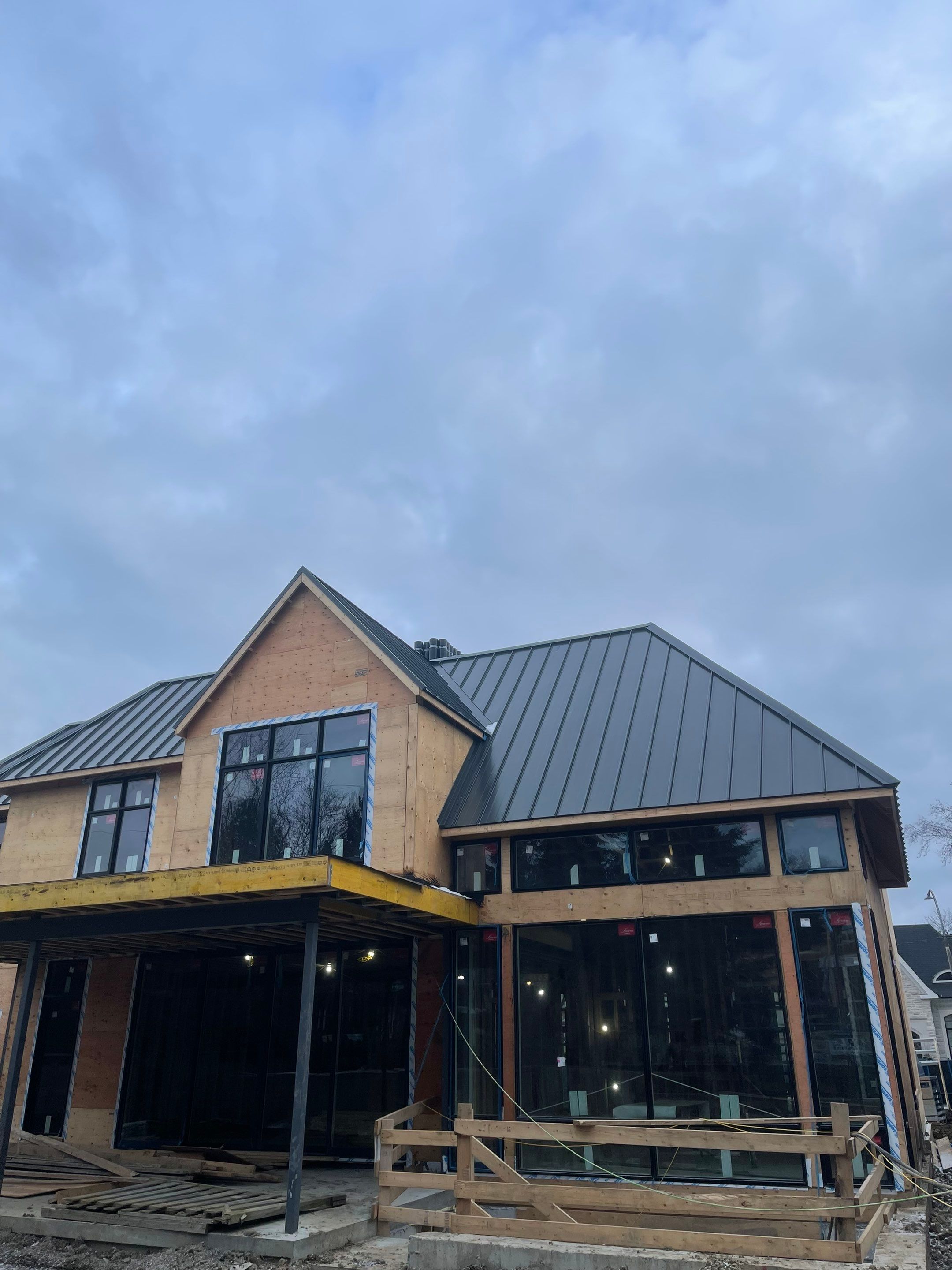 New Home Construction using 16" Standing Seam Panels by Jay Carter Roofing & Sheet Metal