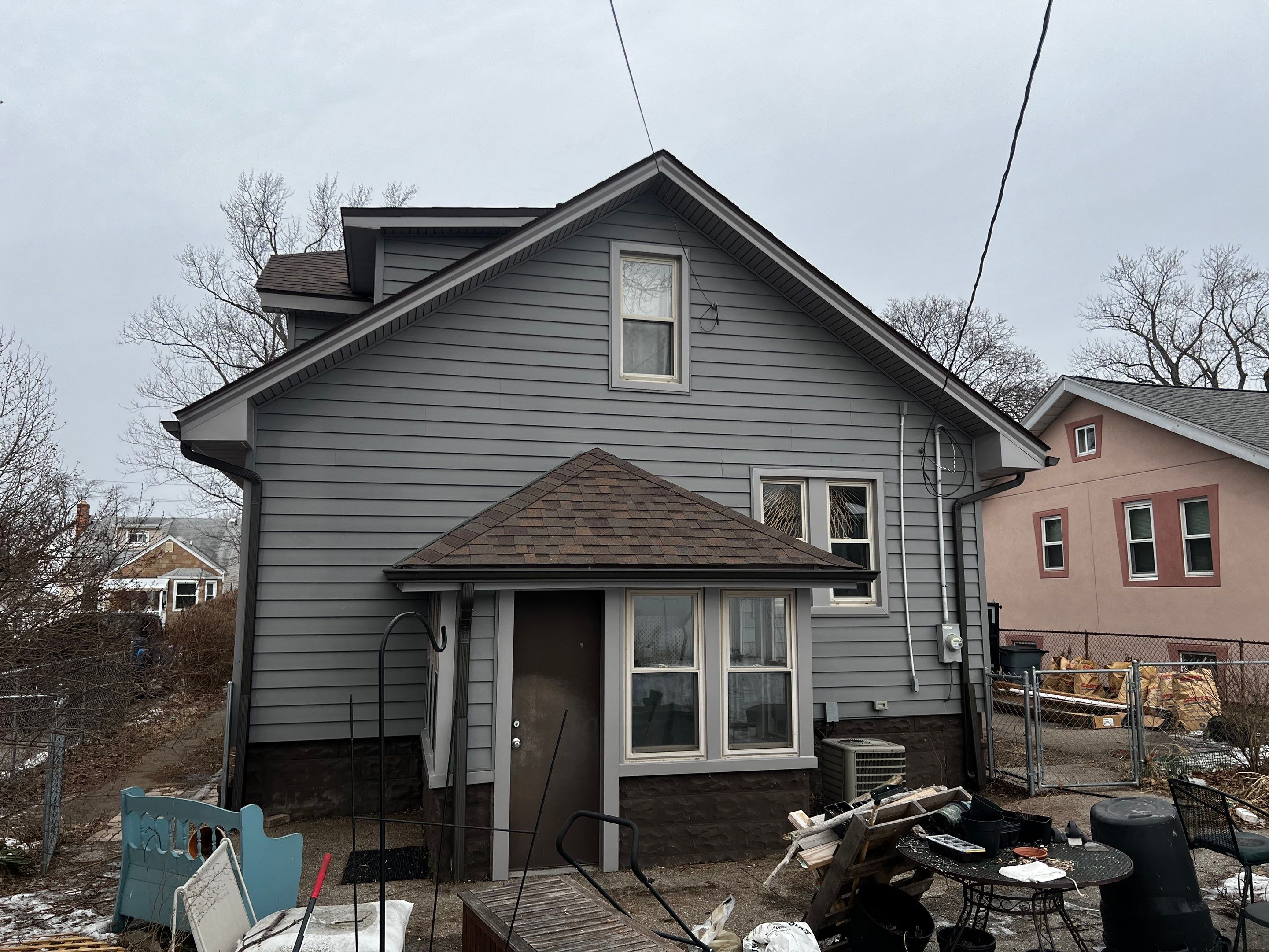 Vinyl Siding Replacement by Bloomfield Construction & Restoration