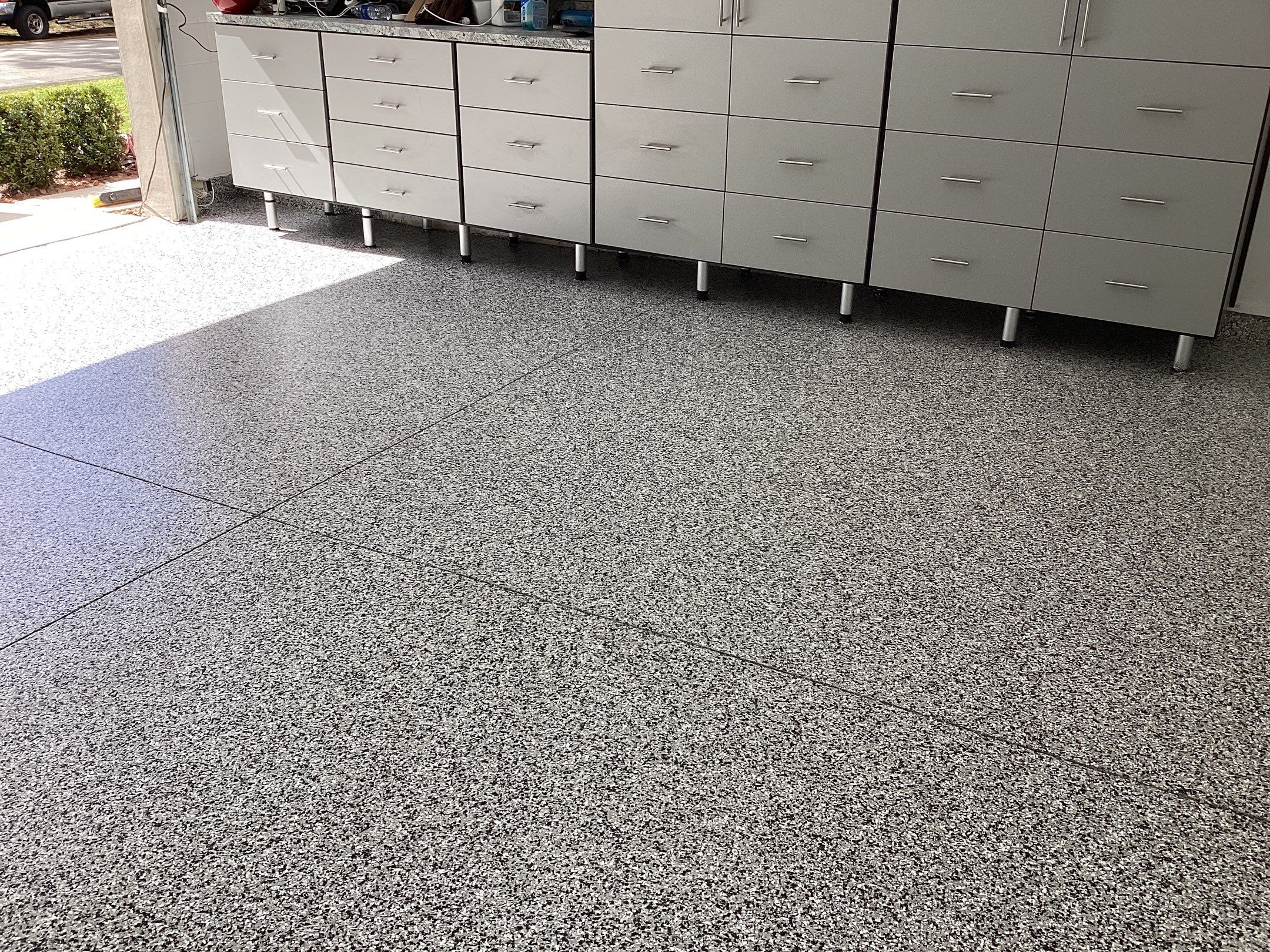 Garage using Domino by Amvet concrete coatings llc
