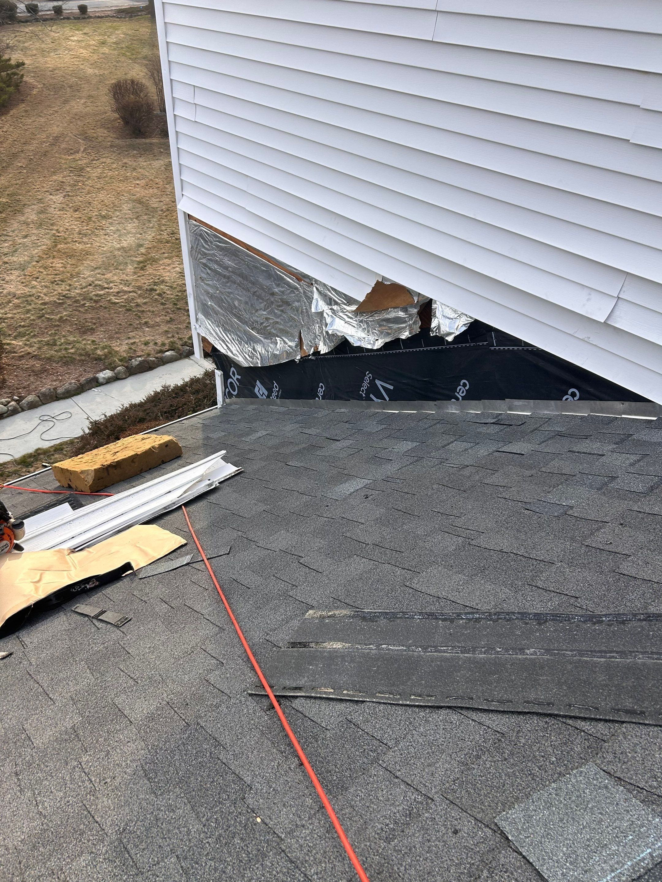 Roof-to-Wall Transition Repair & Alu-Rex Double Pro Gutter Guards in Westford, MA – Leak Fix & Drainage Upgrade by Mighty Dog Roofing of Greater Middlesex County