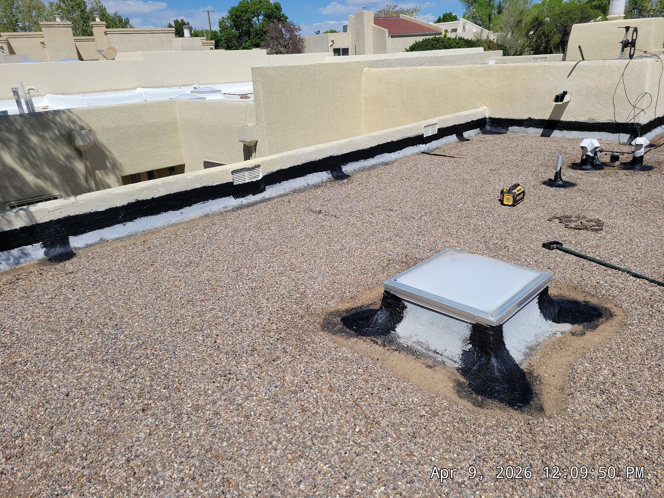 Tar and Gravel Roof Maintenance and Skylight Sealing in Rio Rancho by Doyle Roof Masters Inc