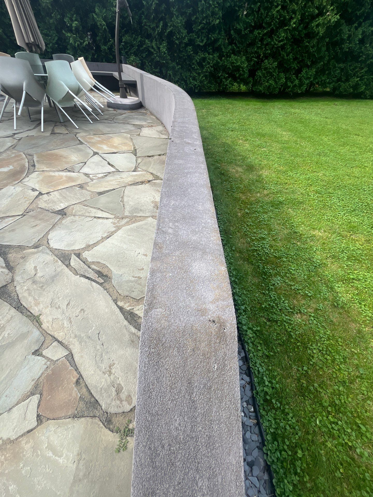 roof washing using Algaecide, soft wash soap by Northern Power Washing LLC.