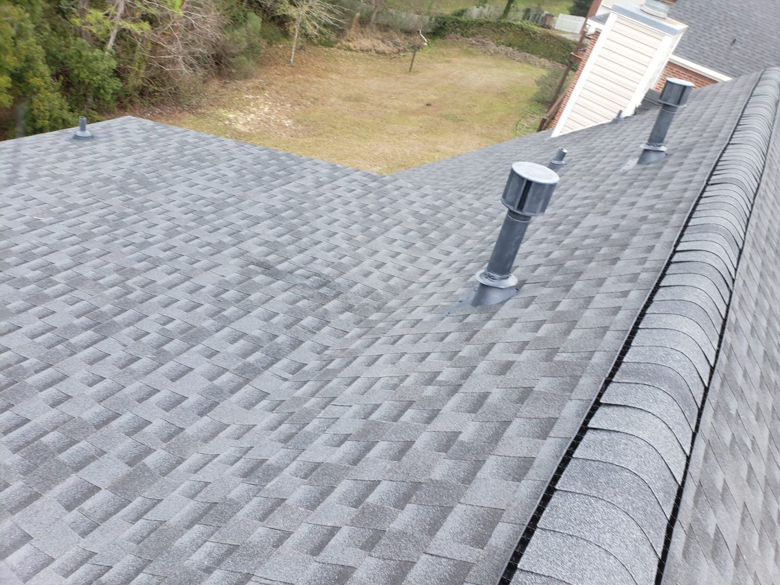 Residential Roofing Installation using Roof Replacement by American Roofing & Construction LLC