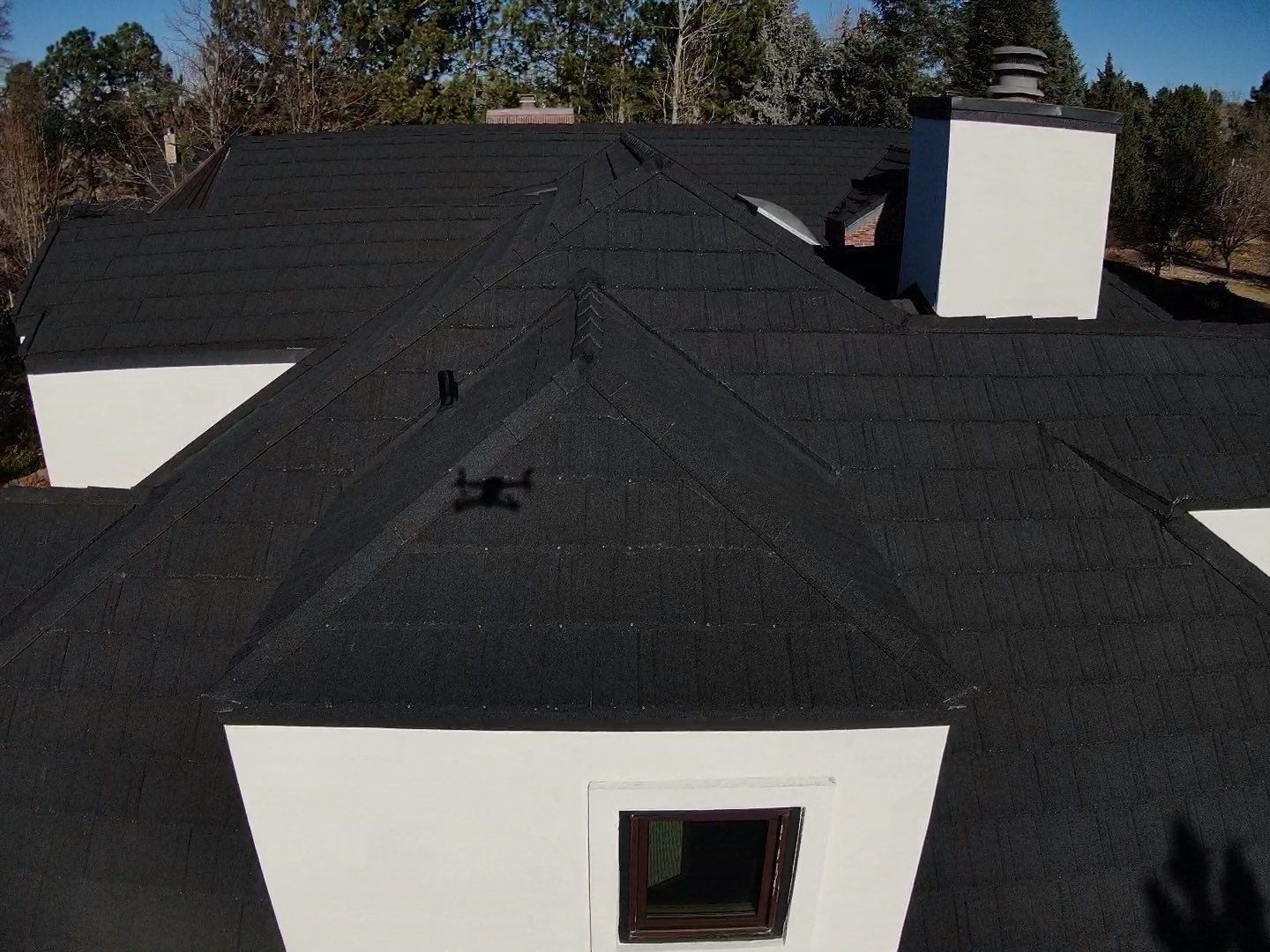 Unified Stone Coated Roof & Stucco Remodle by Blue Peaks Roofing LLC