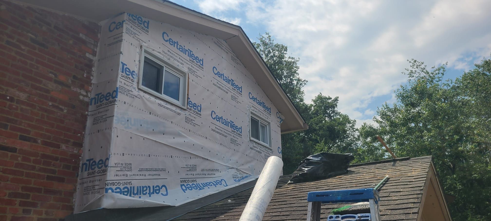 Fairfax: Residential Siding Replacement with CertainTeed 8" Board and Batten Siding in Desert Tan by RM Banning, Inc.