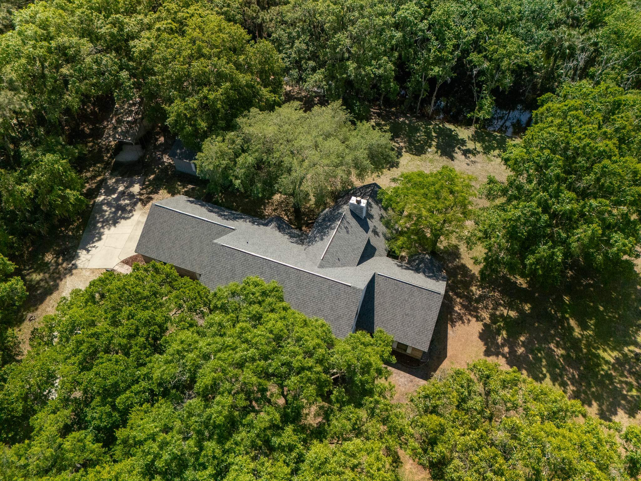 Complete Asphalt Shingle Roof Replacement in Merritt Island, Florida by Wiedmann Construction & Roofing