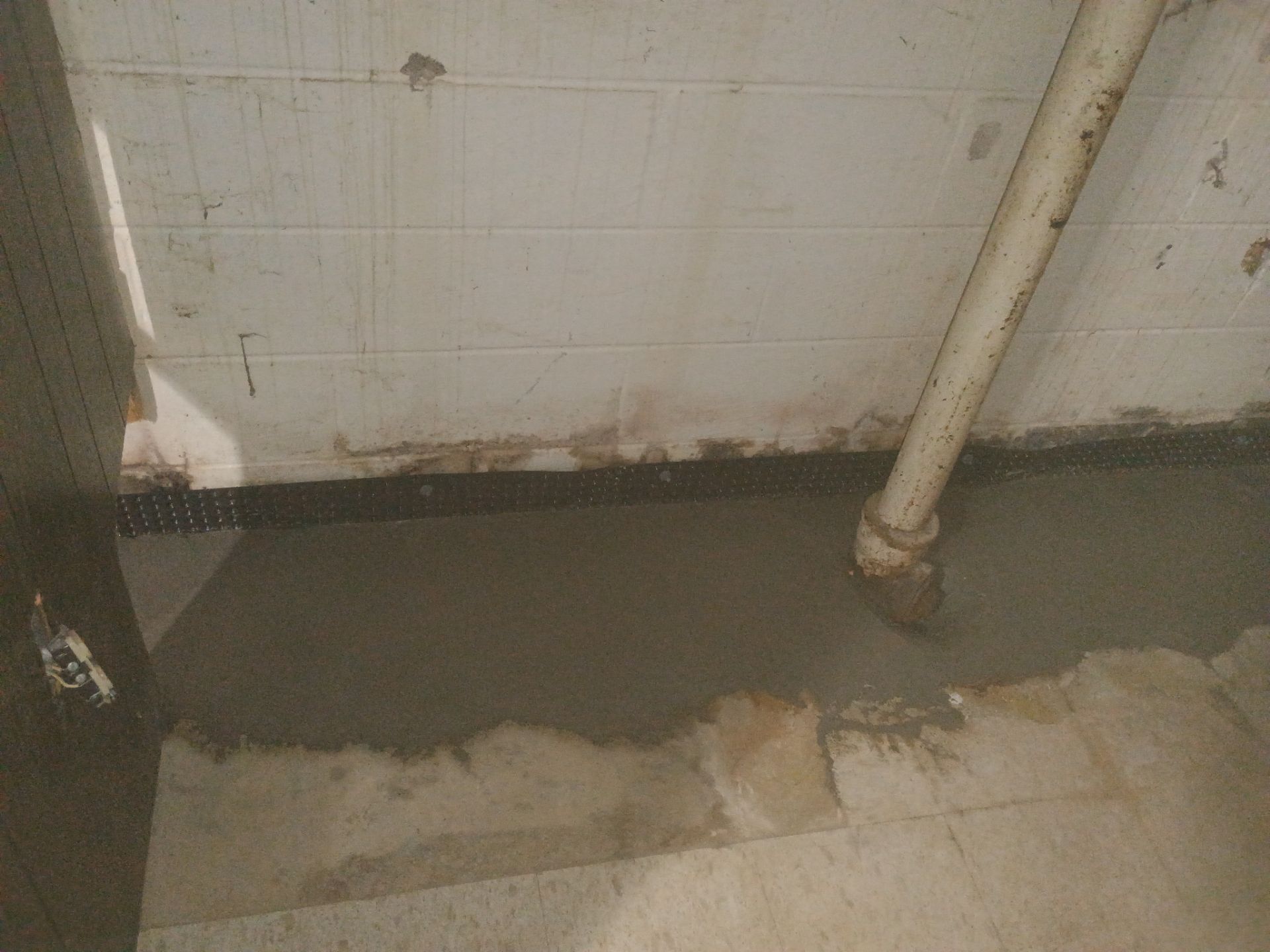 Interior Drain Tile Installation in Columbia Heights, MN by Waterproofing Northeast