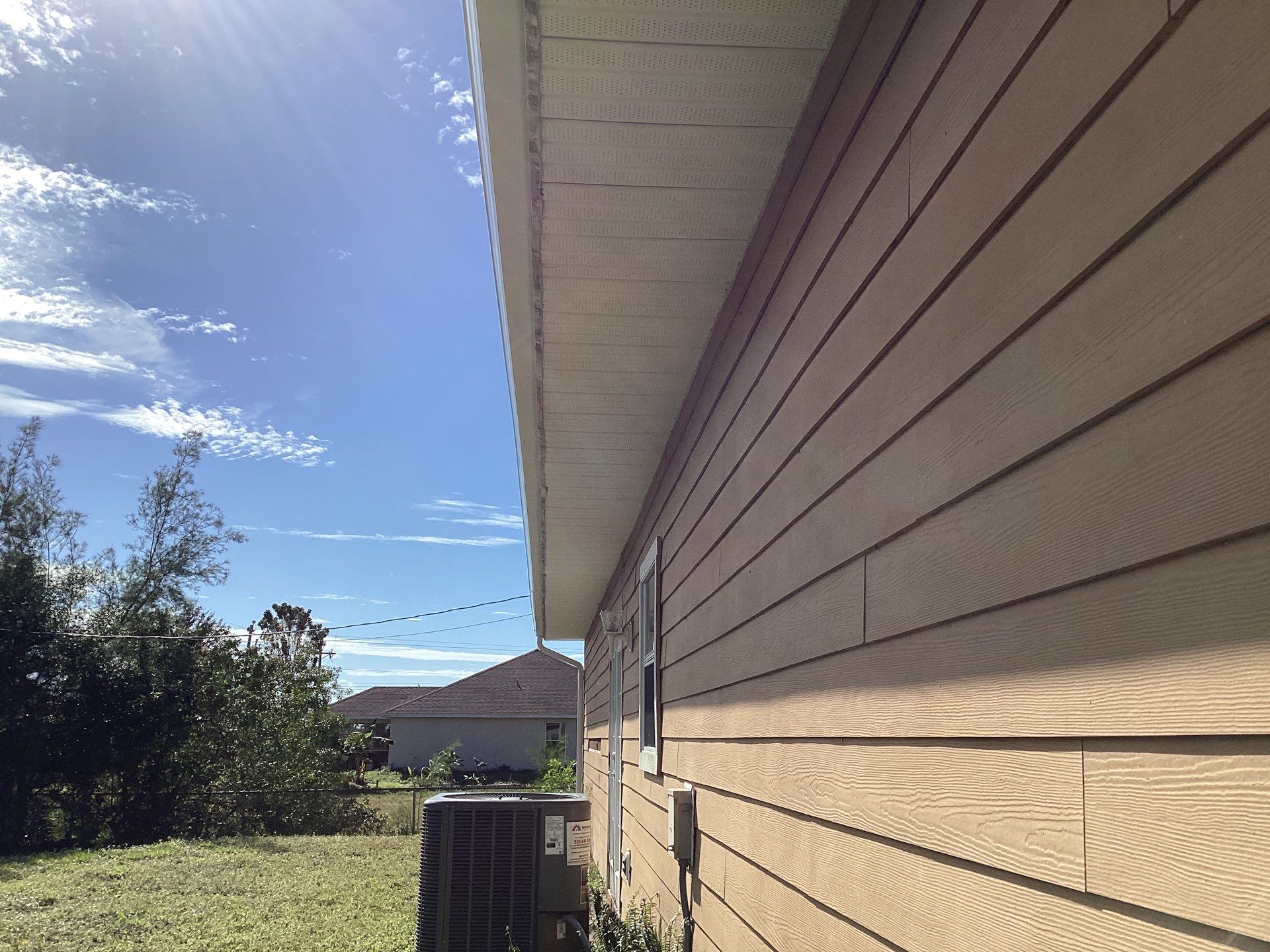 Soffit & Fascia White + New Downspouts by Gutter Professors