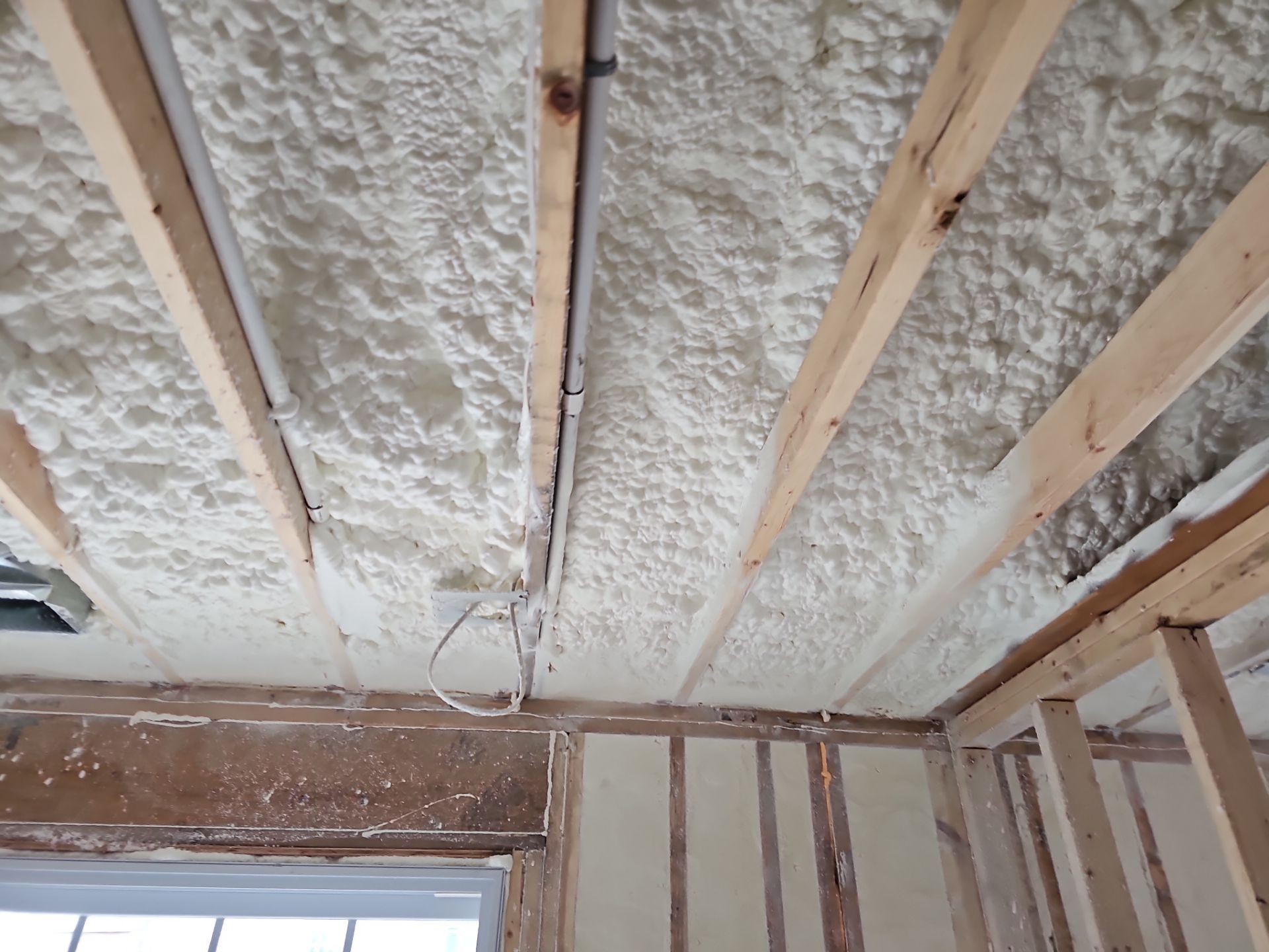 Basement Exterior Walls using Closed Cell Spray Foam by NYS Foam & Energy