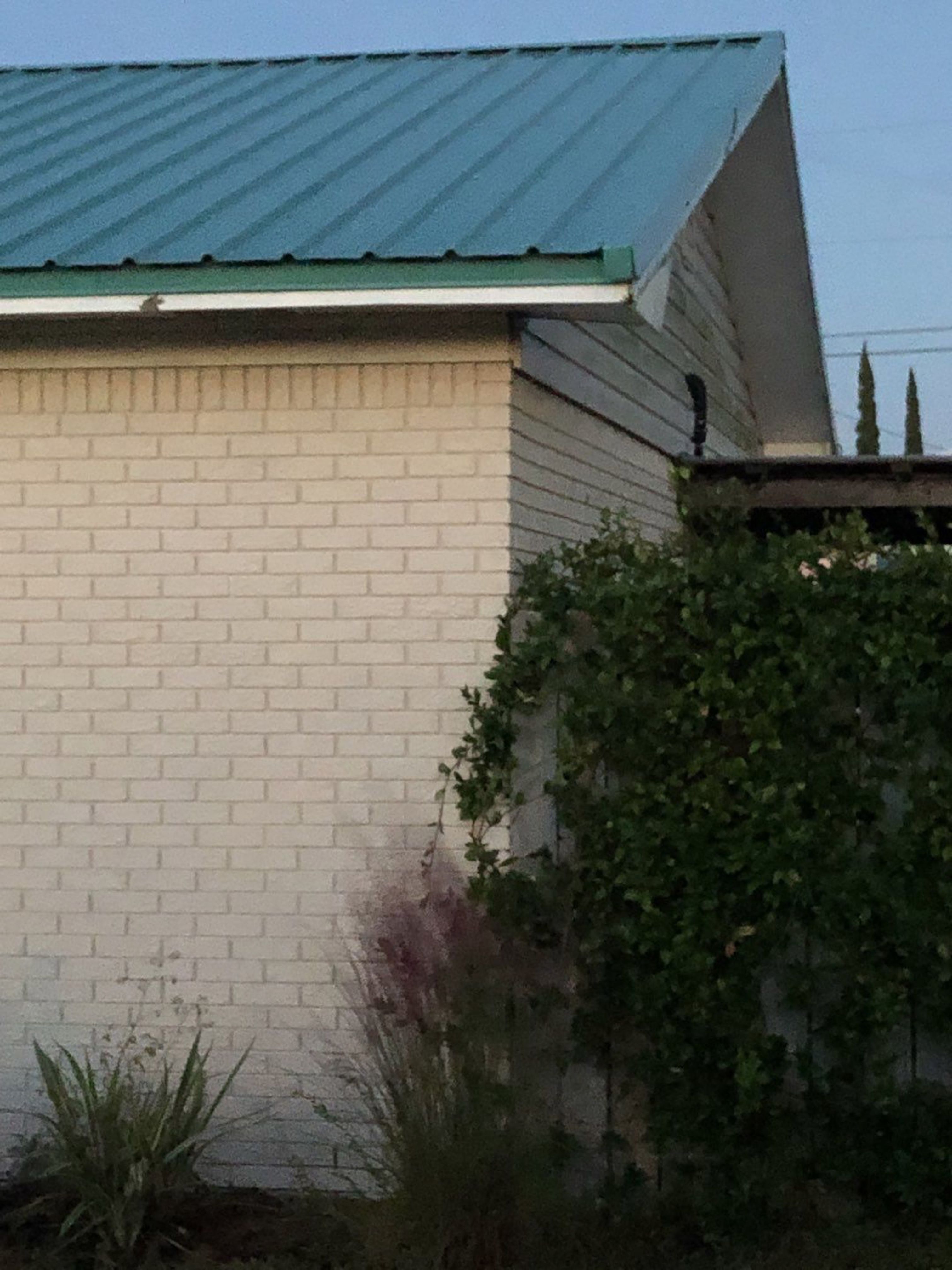 Gutter Installation using K-Style White Seamless Gutters by Gutter Professors