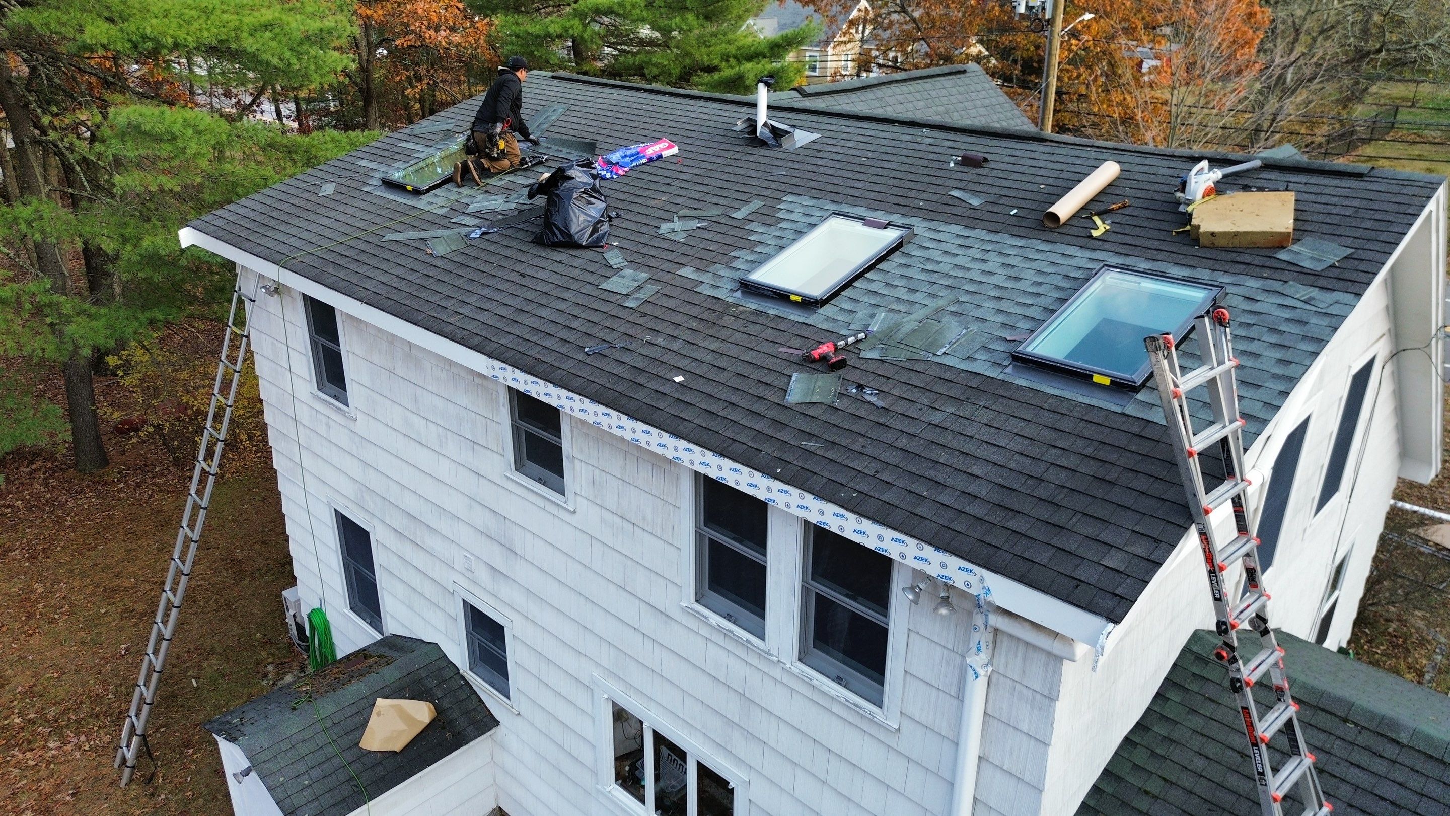 Chelmsford Triple Skylight Leak Repair with Fascia & Shingle Restoration by Mighty Dog Roofing of Greater Middlesex County
