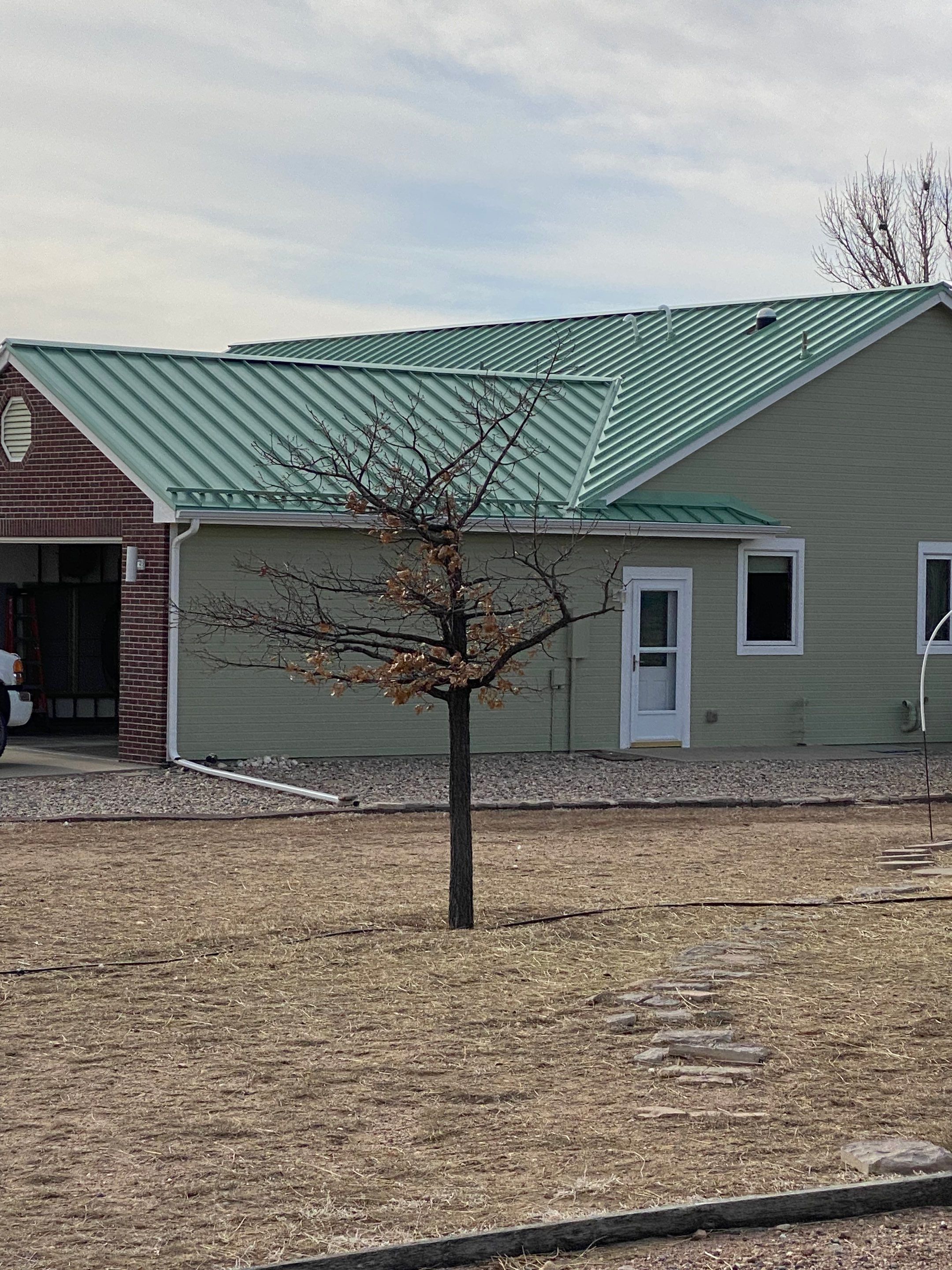 Staning Seam Metal using 1.75" Snap Lock Standing Seam Class 4 Impact Resistant by Black Belt Roofing