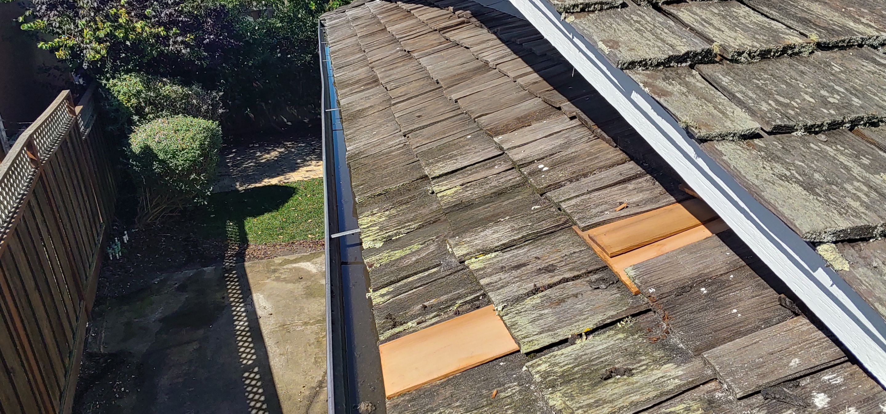 Refurbish and repair shake roof to get ready to sell by Straight Edge Roofing Inc