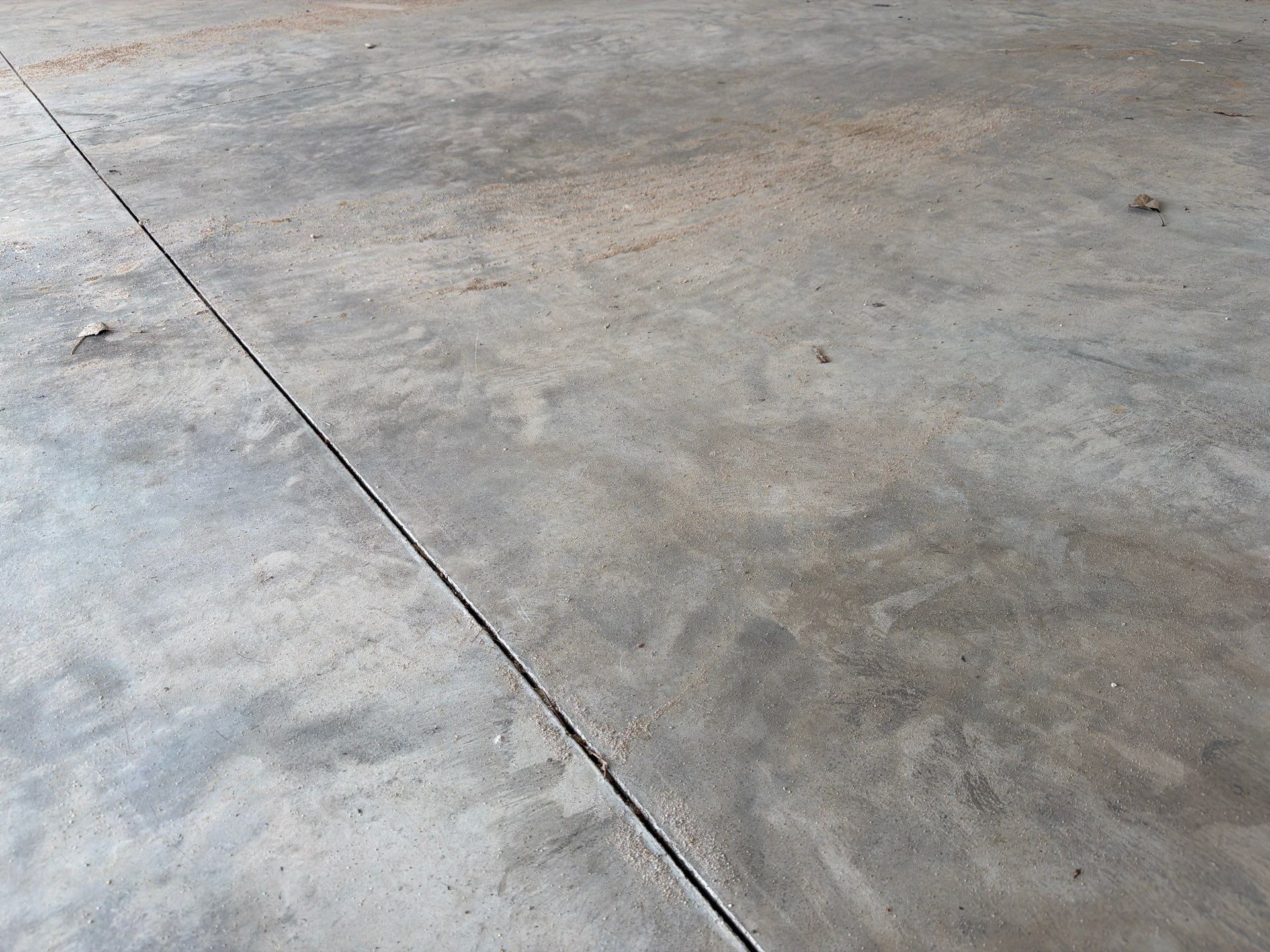 Hartford Residential Garage Floor Transformation With Decorative Chip Coating by Select Painting, Coatings & Garage Cabinets