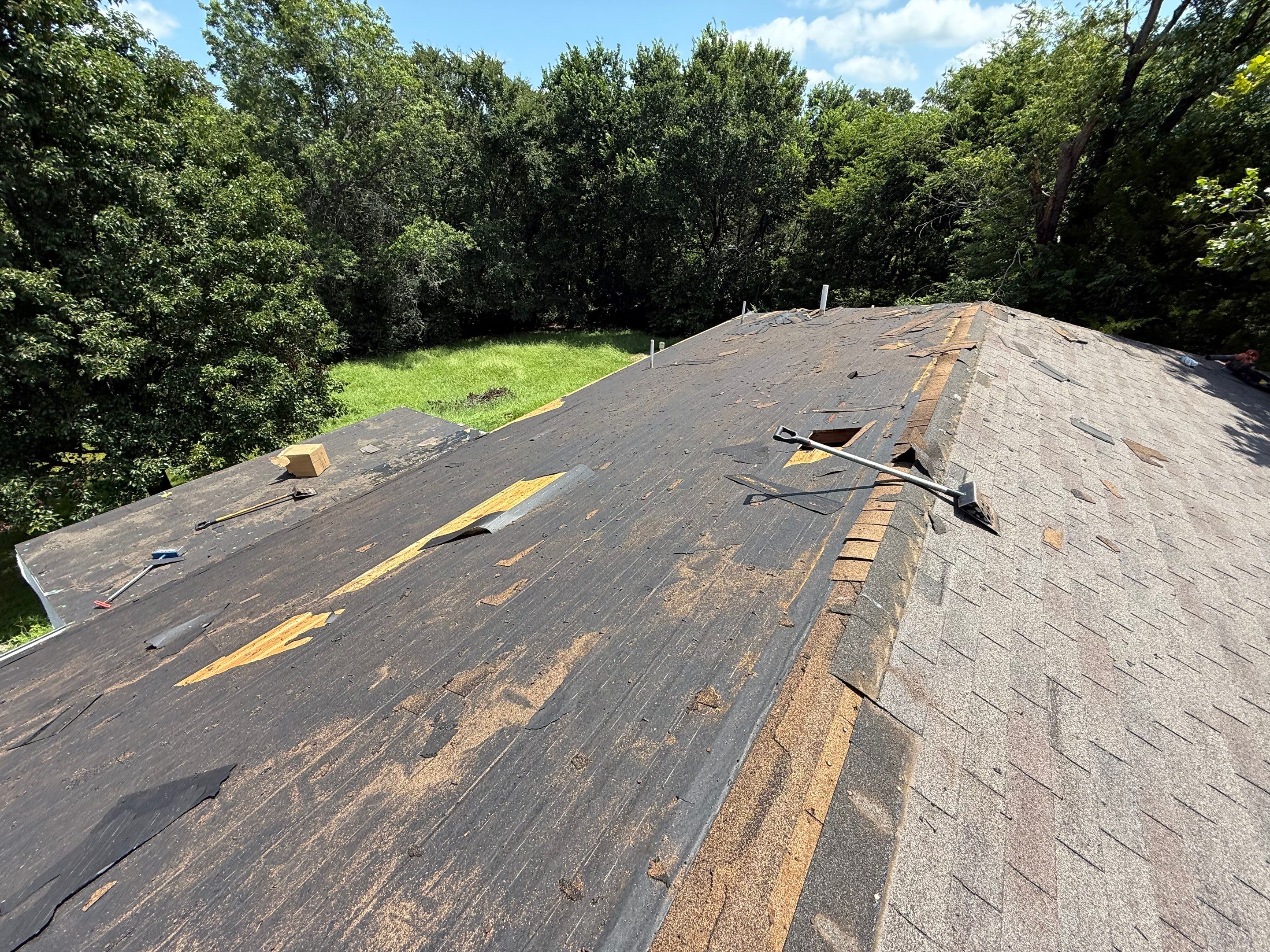 2 layers tear off & installation of new architectural shingles. by In & Out Construction & Remodeling, LLC
