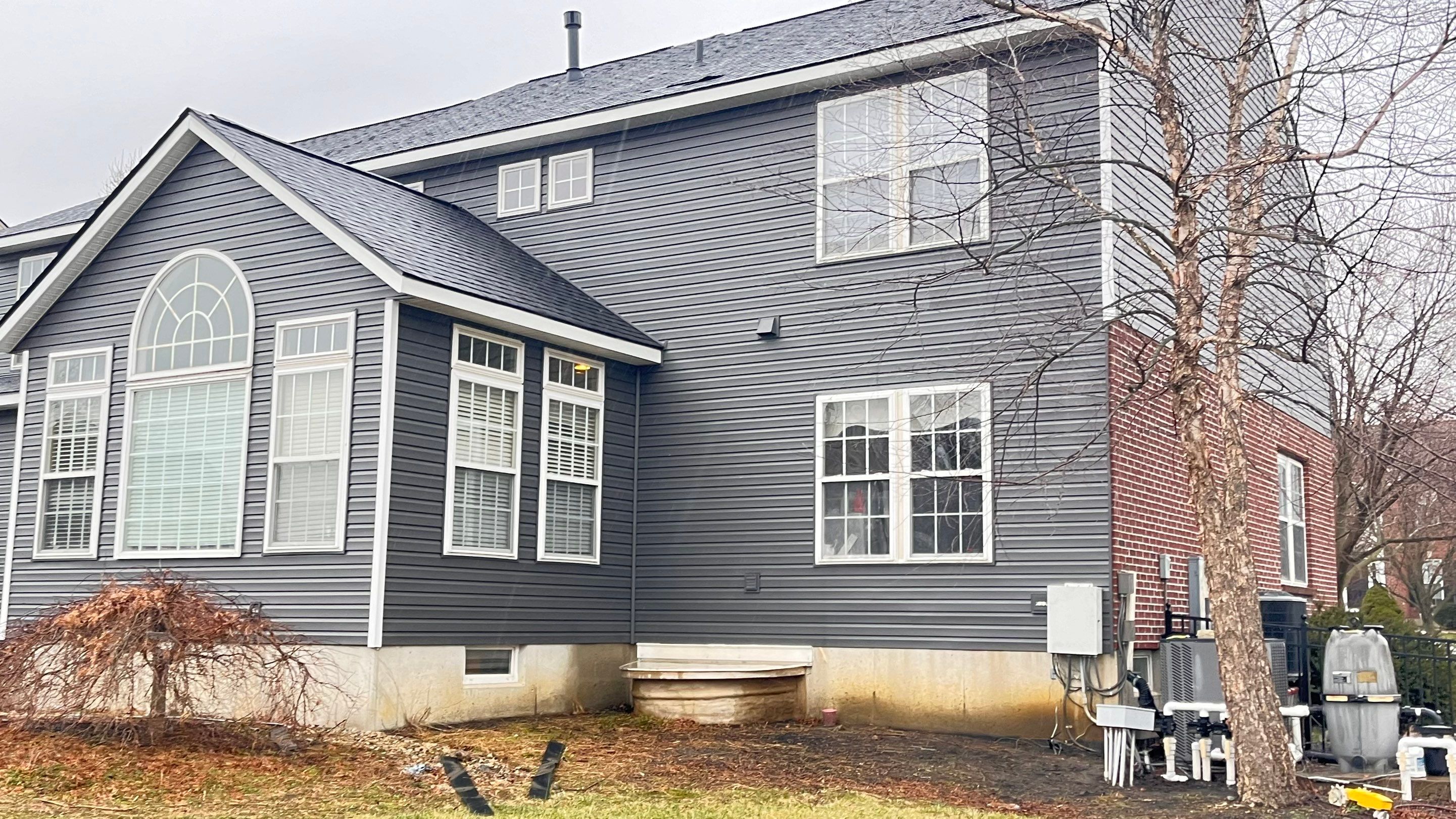 Roofing & Siding  by Tamlin Roofing