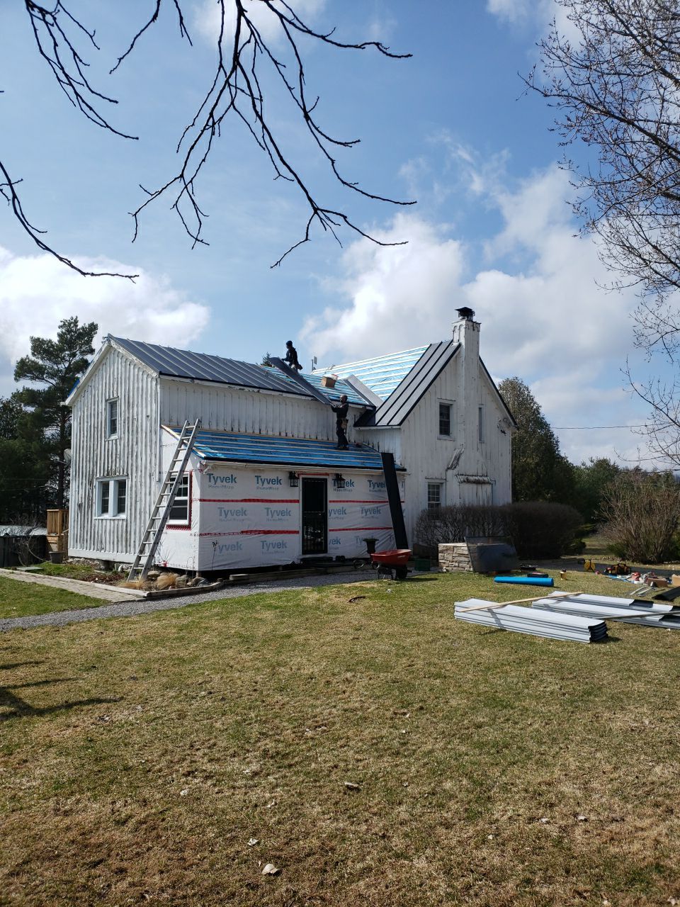 Residential Roofing Installation using 16" Standing Seam Panels by Jay Carter Roofing & Sheet Metal