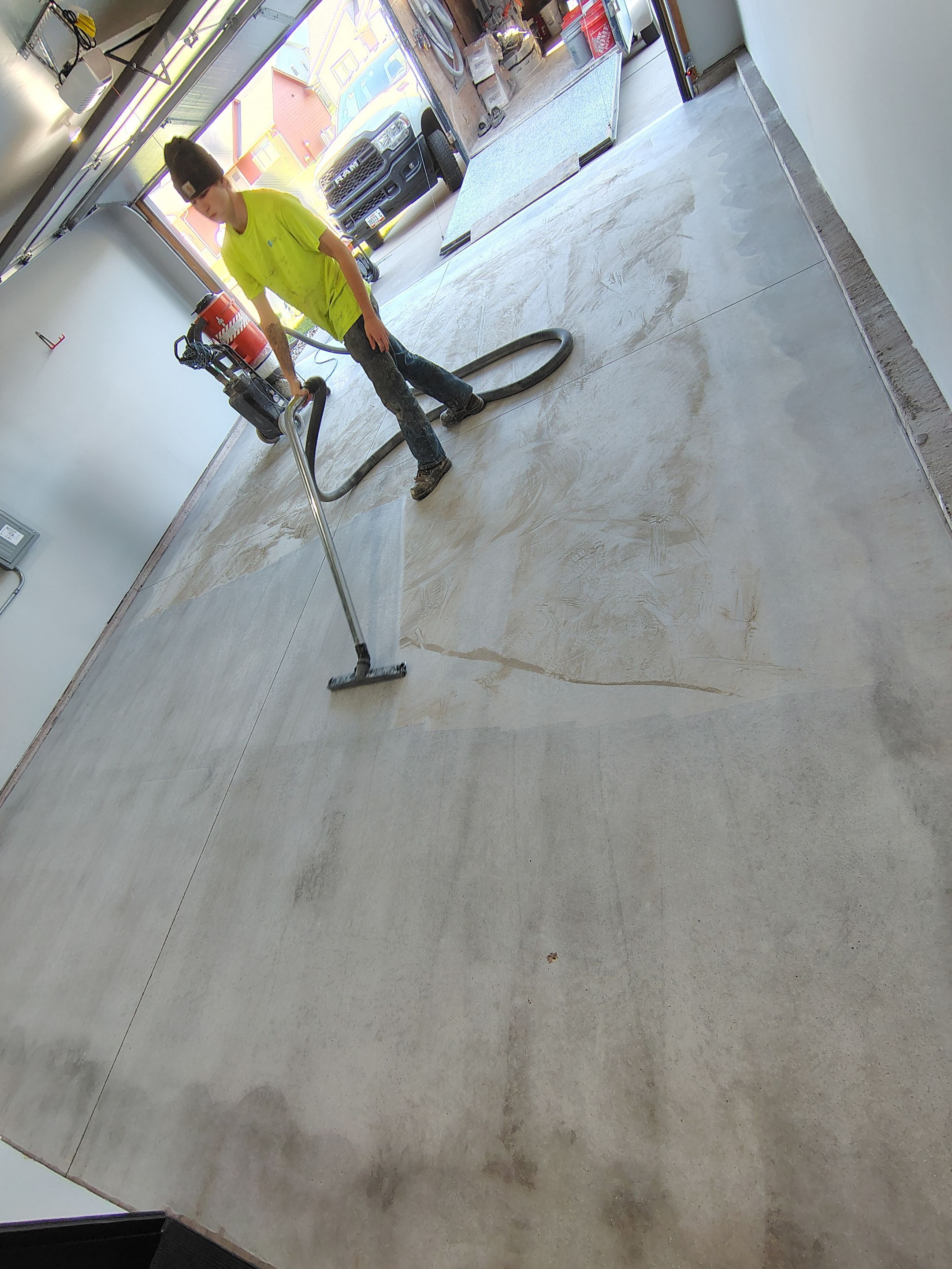 Custom Epoxy Garage Floor Coating Installation in Sioux Falls by Select Painting, Coatings & Garage Cabinets